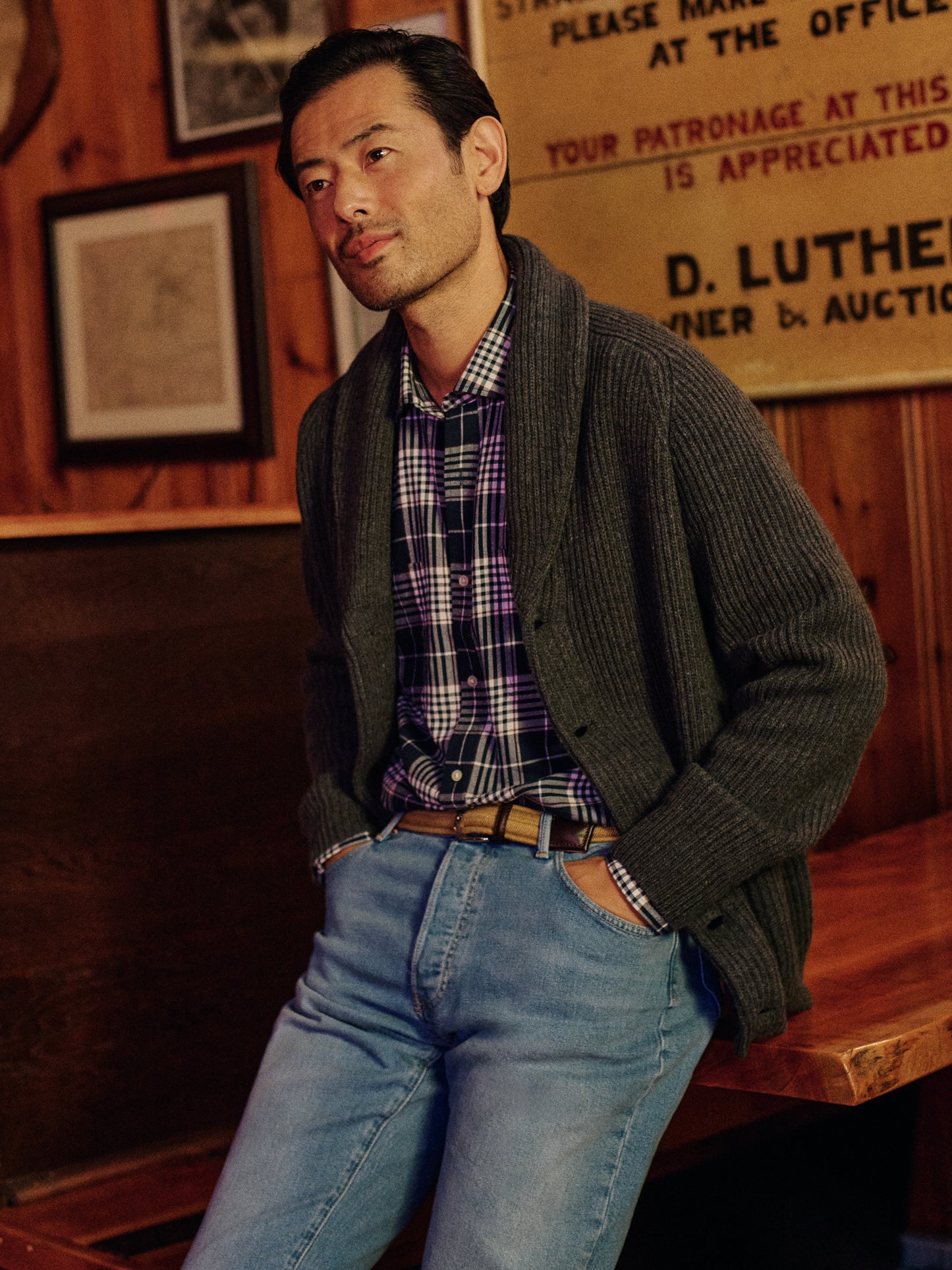 Model wearing J.McLaughlin Roy sweater in charcoal made with lambswool.
