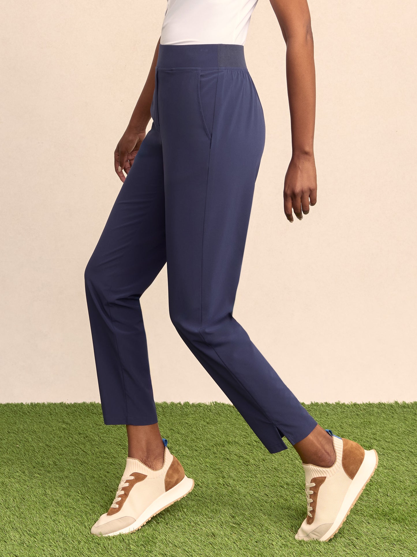 Model wearing J.McLaughlin Beasley pants in navy made with polyester/spandex.