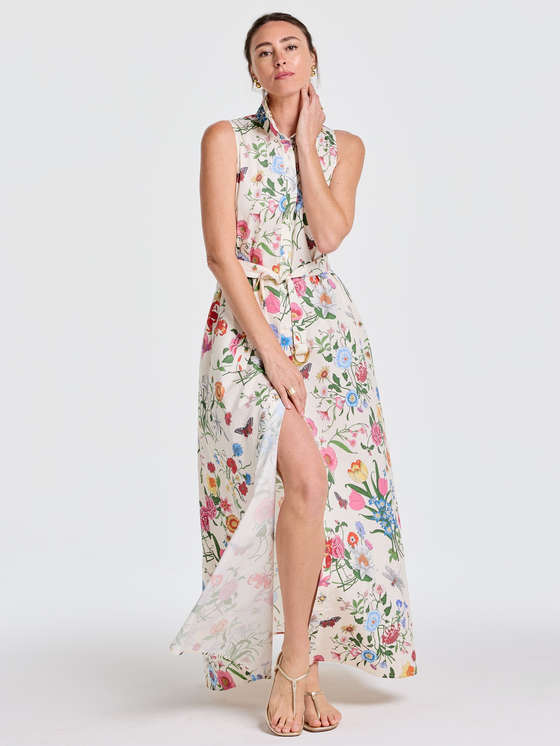 Woman wearing an effortlessly stylish Audrey Dress in Dragonfly Garden by J.McLaughlin, featuring enduring designs with floral patterns, embodying innovative fabrics and a legacy of timeless fashion. A destination for defining style. Life, Well-Lived.