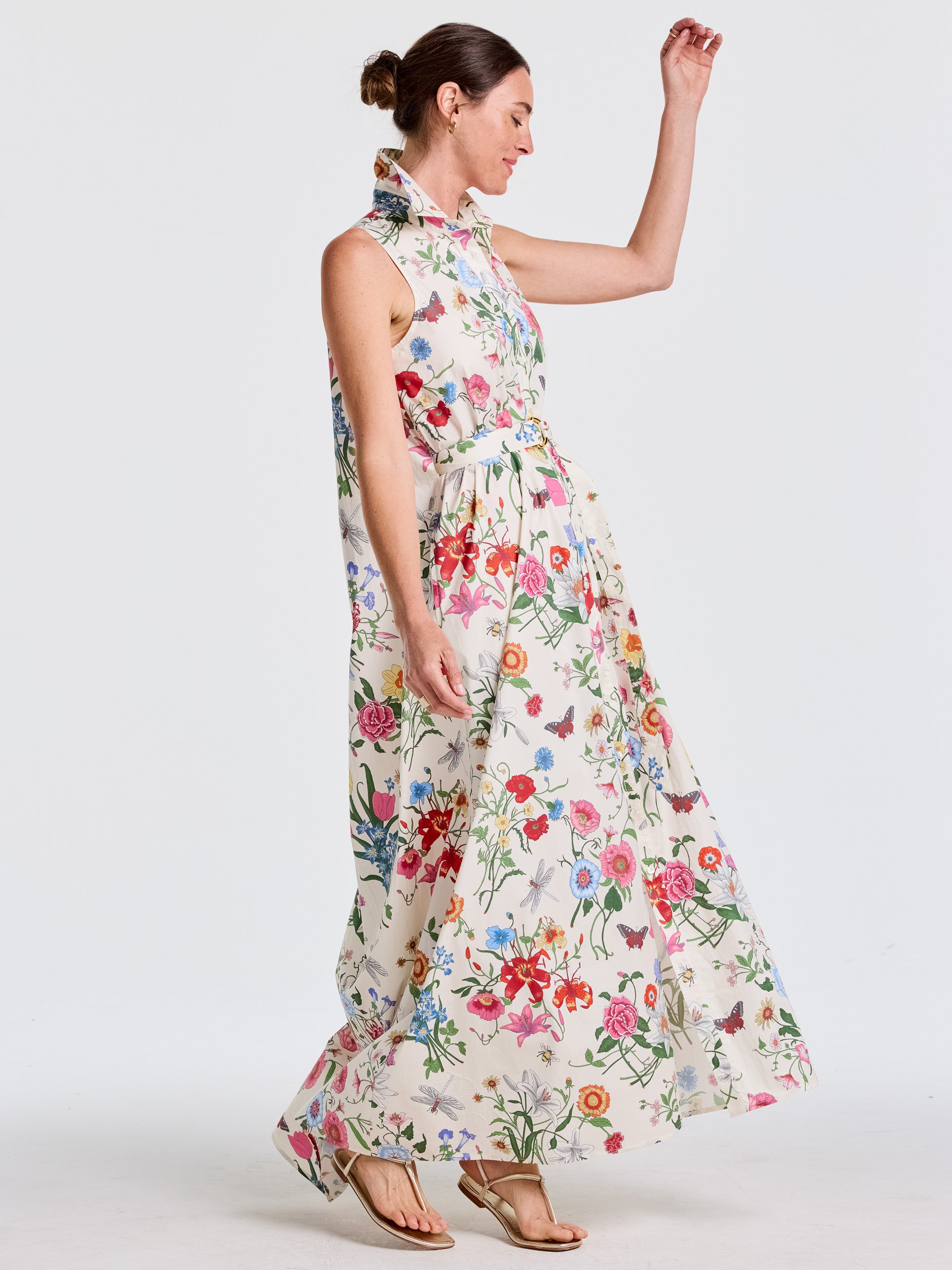 Woman wearing an effortlessly stylish Audrey Dress in Dragonfly Garden by J.McLaughlin, featuring a floral print with enduring designs and innovative fabrics for timeless fashion.