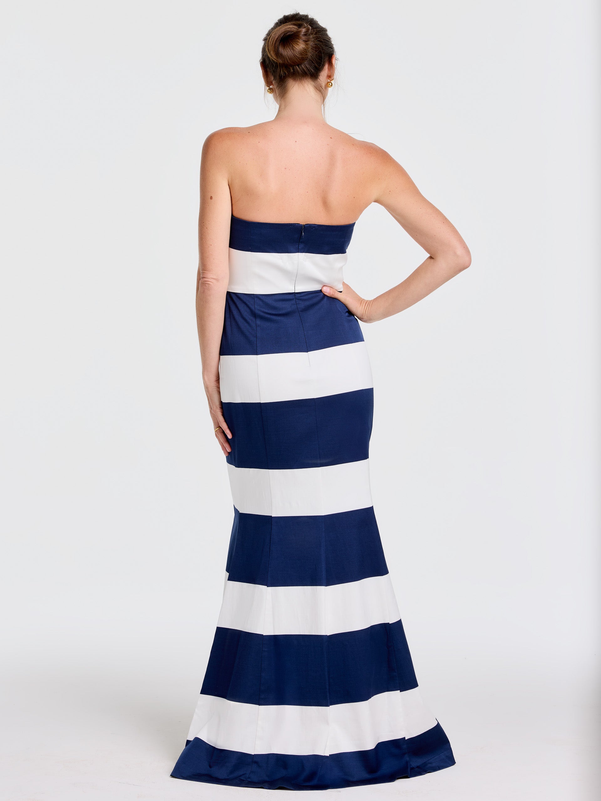 Woman modeling the Ashley Dress in Mega Mariner Stripe by J.McLaughlin, featuring effortlessly stylish, enduring designs with bold navy and white horizontal stripes, perfect for a life well-lived.