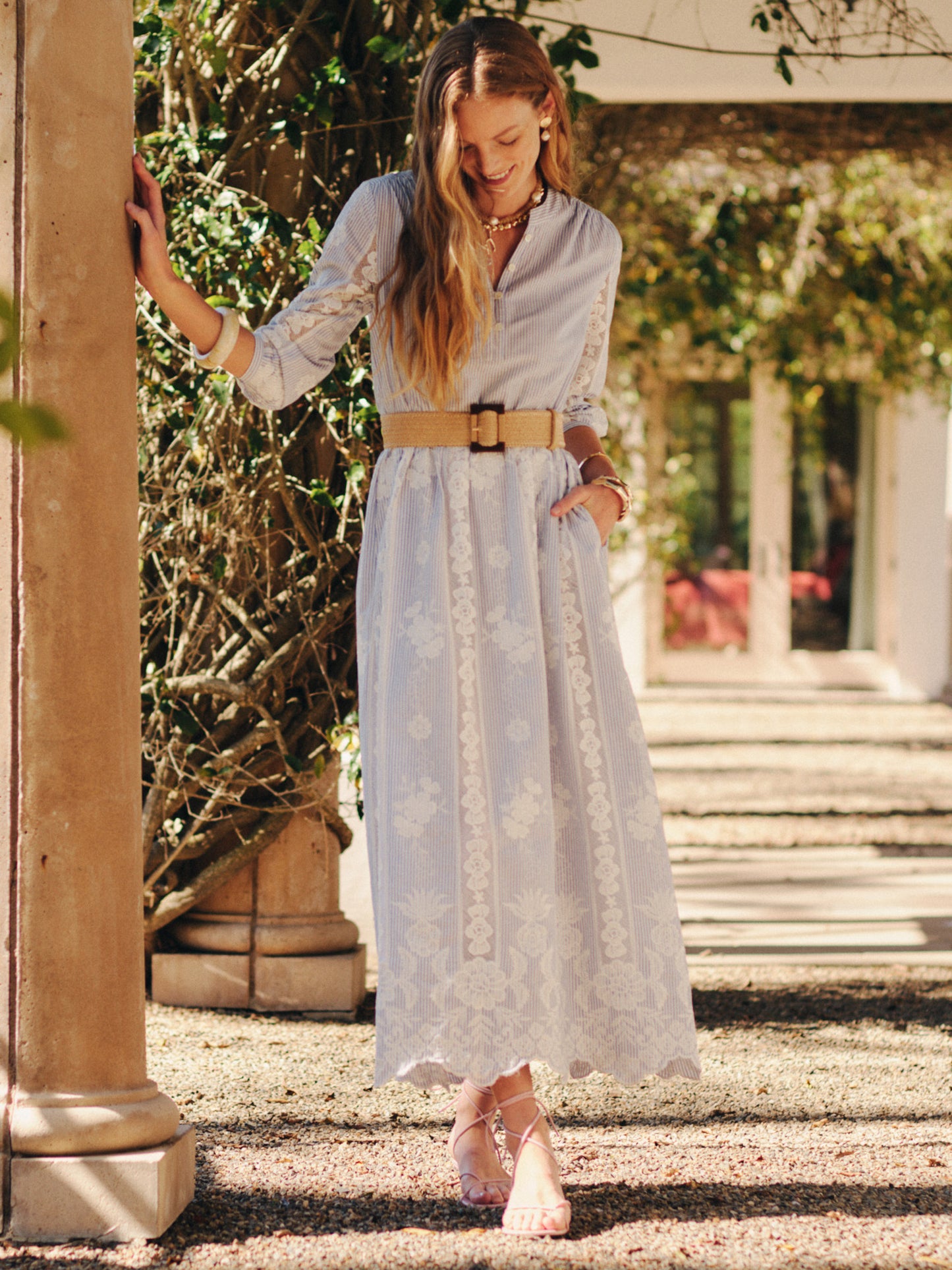 Woman wearing a Margaret Dress in Stripe by J.McLaughlin, featuring an effortlessly stylish design with innovative fabrics and a classic silhouette, embodying enduring designs for a life well-lived.