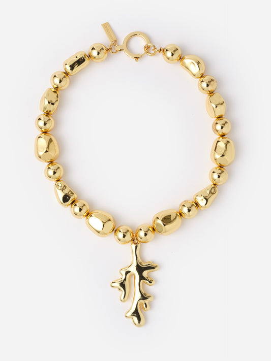 Coral Necklace from J.McLaughlin featuring polished gold beads and a sculpted coral pendant, embodying effortlessly stylish, enduring designs with timeless appeal.