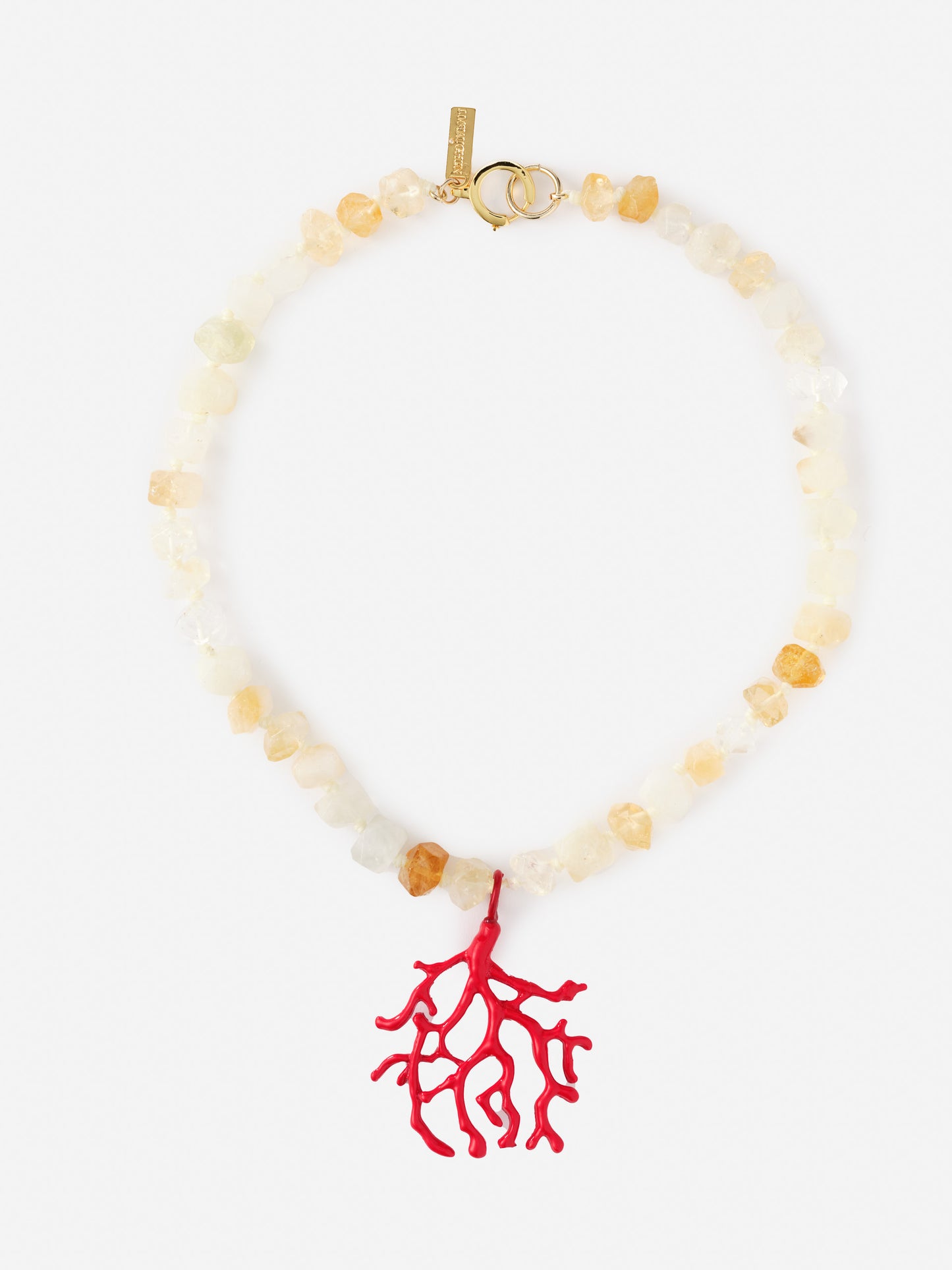Coral Necklace by J.McLaughlin features a striking red coral pendant with natural stone beads, embodying effortlessly stylish design and enduring elegance for a life well-lived.