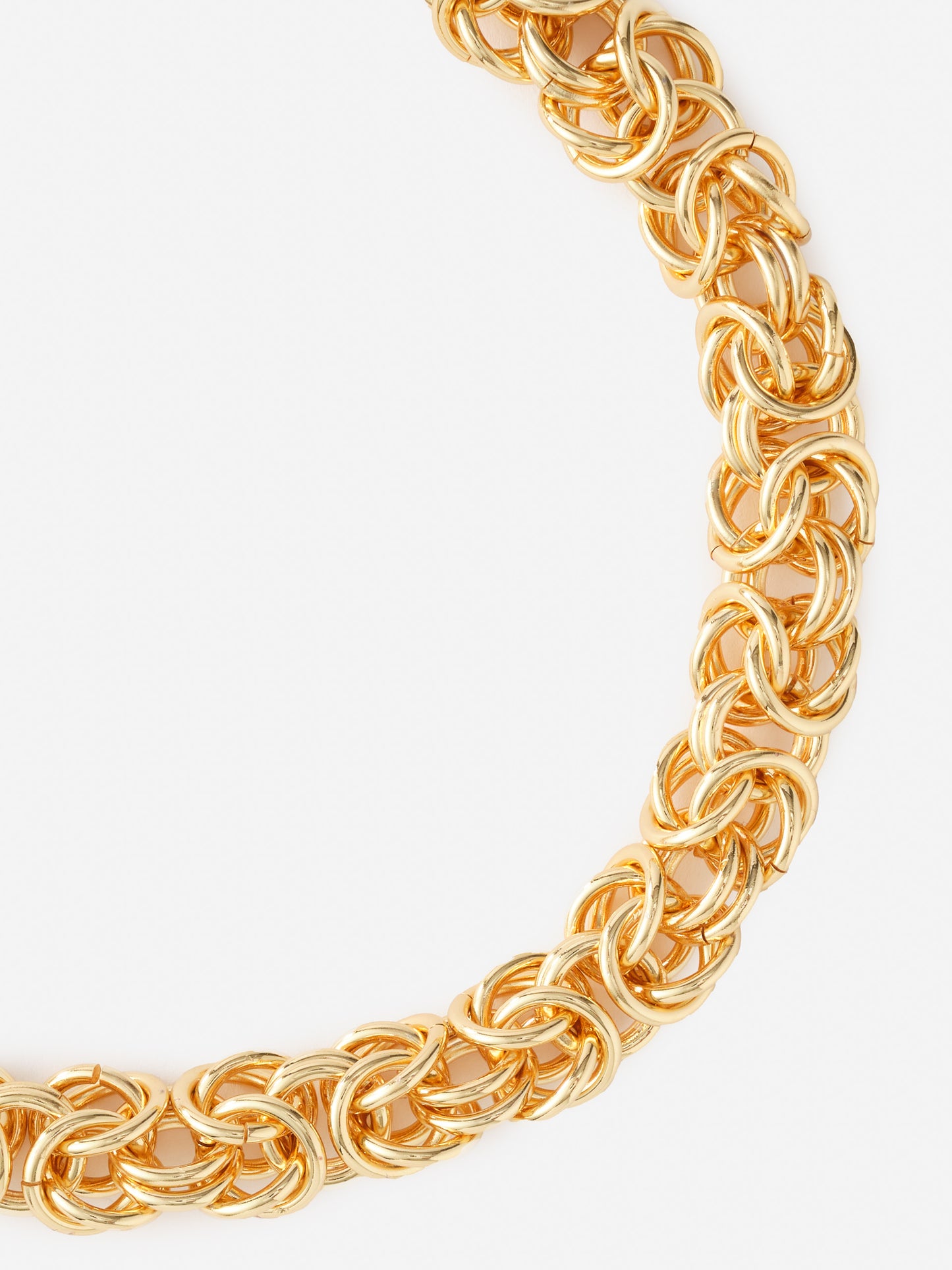 Close-up of the Intertwined Link Chain Necklace by J.McLaughlin showcasing effortlessly stylish craftsmanship with enduring designs, reflecting a legacy of timeless fashion. A destination for defining style. Life, Well-Lived.