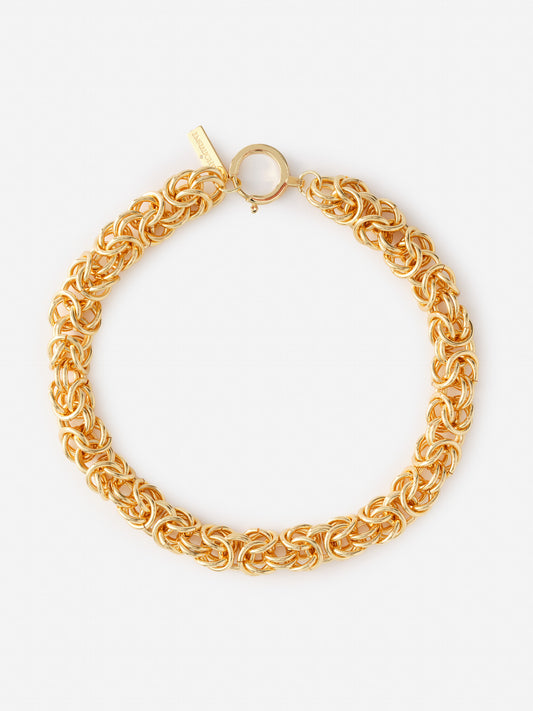 Intertwined Link Chain Necklace by J.McLaughlin in polished gold-tone metal, showcasing effortlessly stylish, enduring designs and a legacy of timeless fashion. A destination for defining style. Life, Well-Lived.