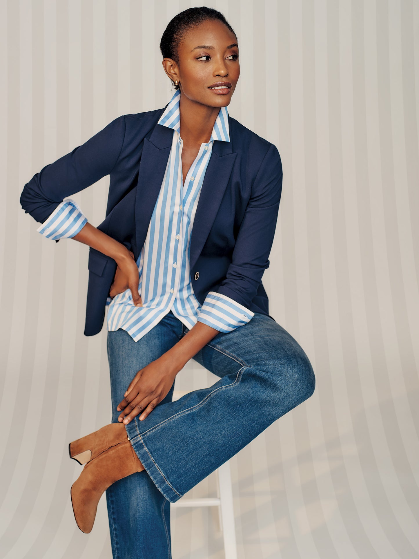 Model wearing J.McLaughlin Triana blazer in winter navy made with Bainbridge cloth.