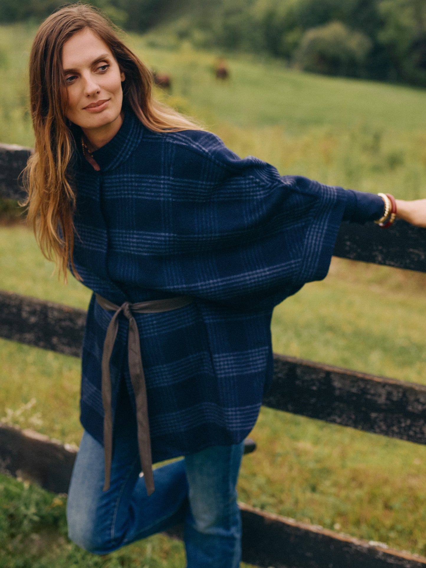 J.McLaughlin Terin ponchos in dark navy made with wool/visocose.
