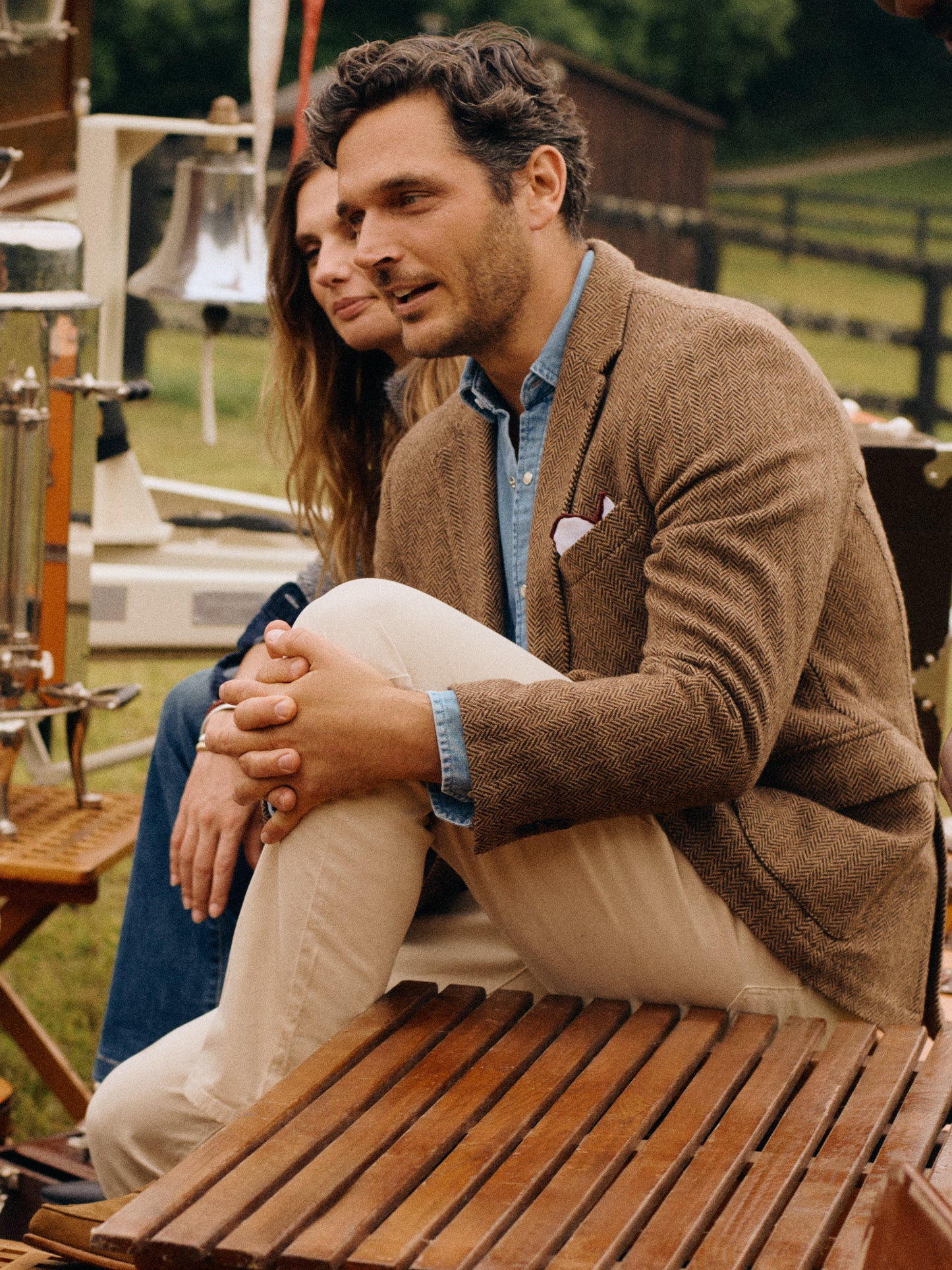 Model wearing J.McLaughlin McCown blazer in beige/brown made with wool.