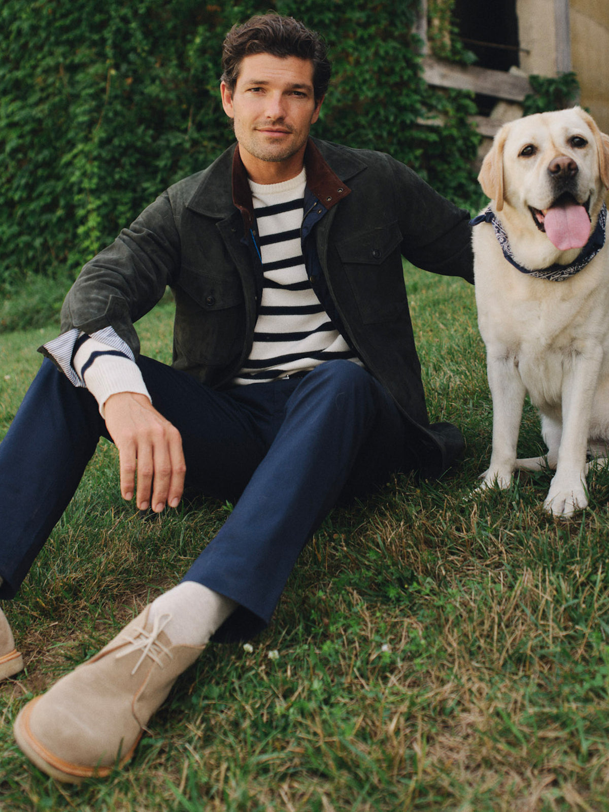 J.McLaughlin William Suede Jacket in dark suede worn outdoors with a striped shirt and dog for timeless everyday style