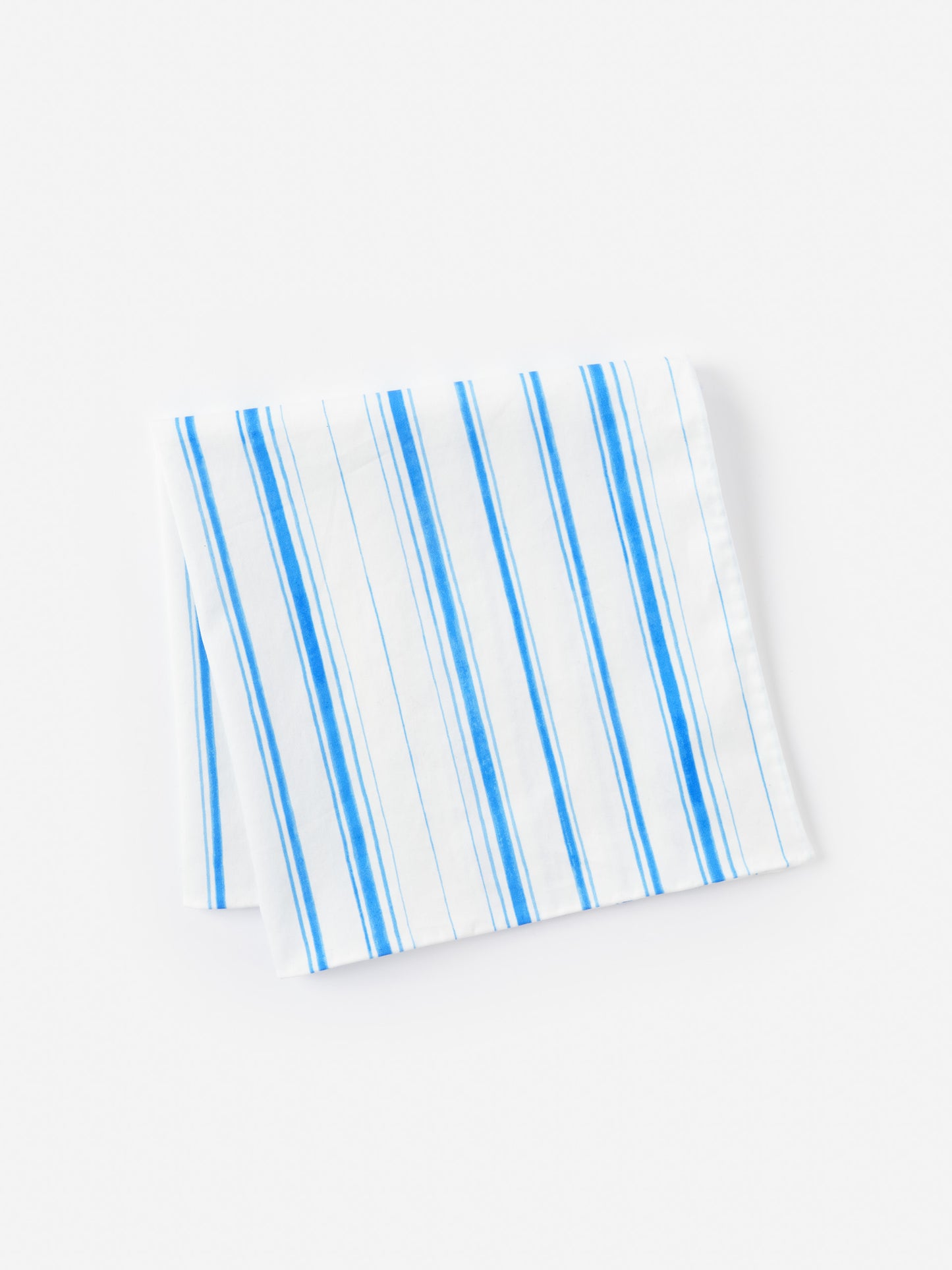 Ralph Neckerchief in Coastal Waterline by J.McLaughlin features effortlessly stylish blue and white stripes, reflecting enduring designs and a legacy of timeless fashion. A destination for defining style. Life, Well-Lived.