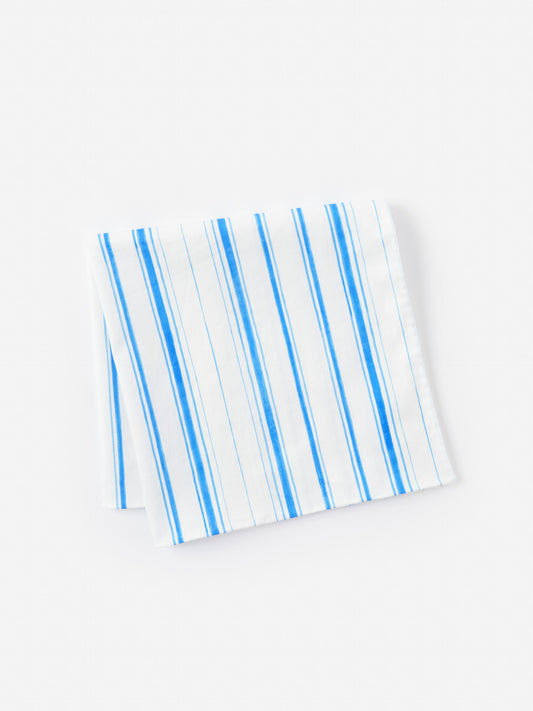 Ralph Neckerchief in Coastal Waterline by J.McLaughlin features effortlessly stylish blue and white stripes, reflecting enduring designs and a legacy of timeless fashion. A destination for defining style. Life, Well-Lived.