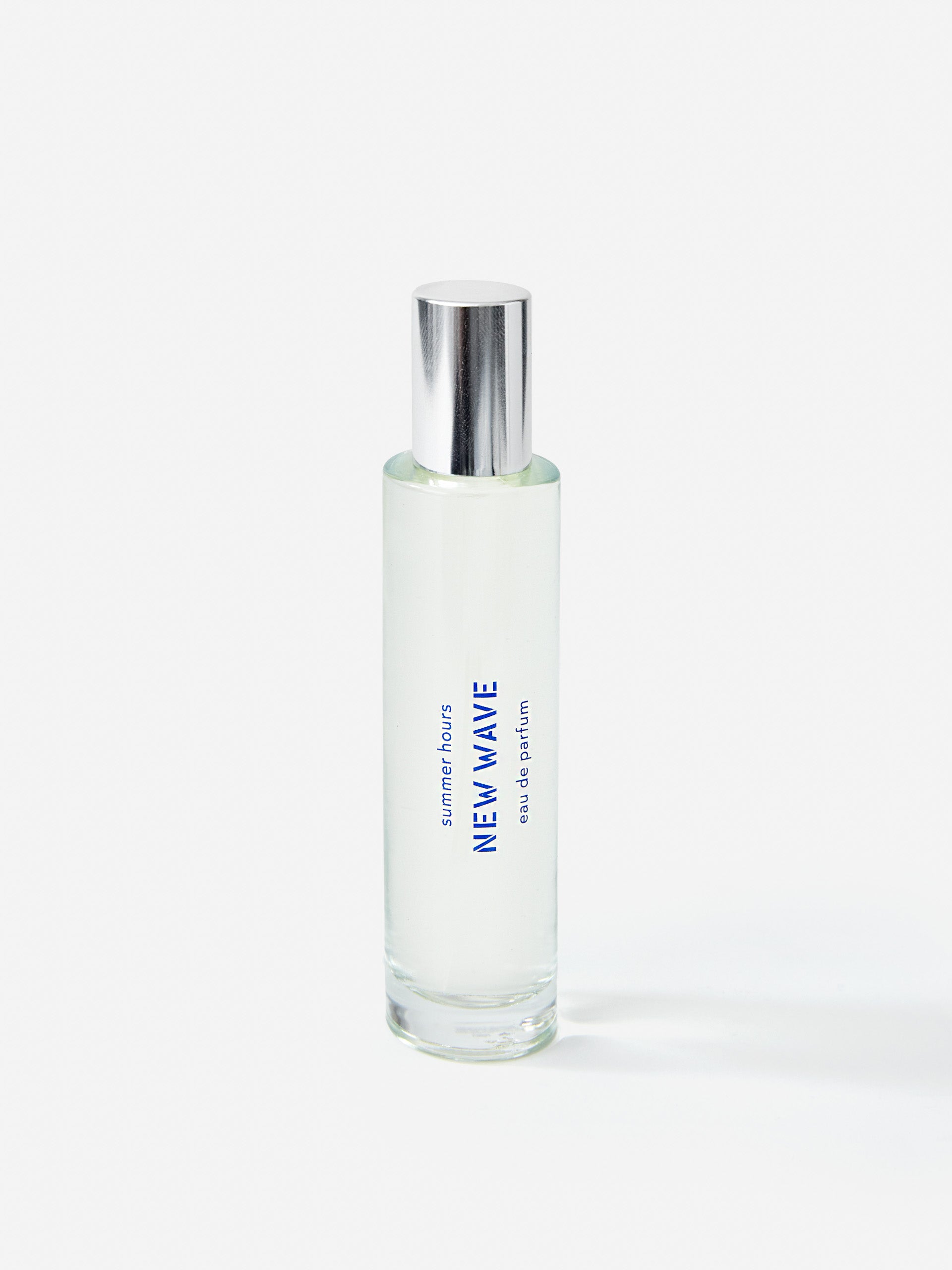 J.McL x Summer Hours New Wave 50 mL Fragrance in blue made with alcohol and water.