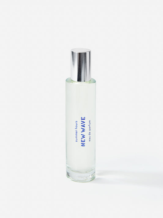 J.McL x Summer Hours New Wave 50 mL Fragrance in blue made with alcohol and water.