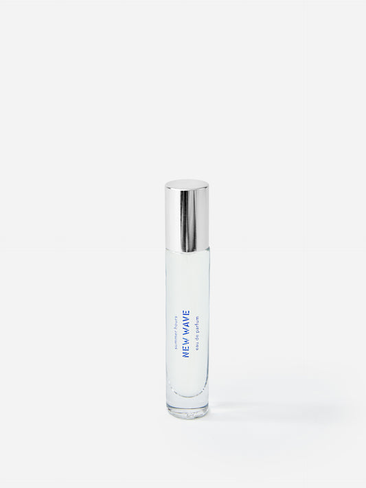 J.McL x Summer Hours New Wave 15 mL Fragrance in blue made with alcohol and water.