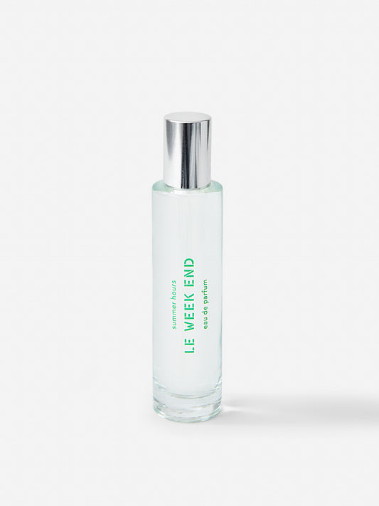 J.McL x Summer Hours Le Week End 50 mL Fragrance in green made with alcohol and water.