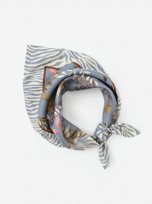 Nikka Silk Scarf in Zebra Story Court by J.McLaughlin showcasing innovative fabrics and enduring designs, effortlessly stylish for a legacy of timeless fashion – A destination for defining style. Life, Well-Lived.