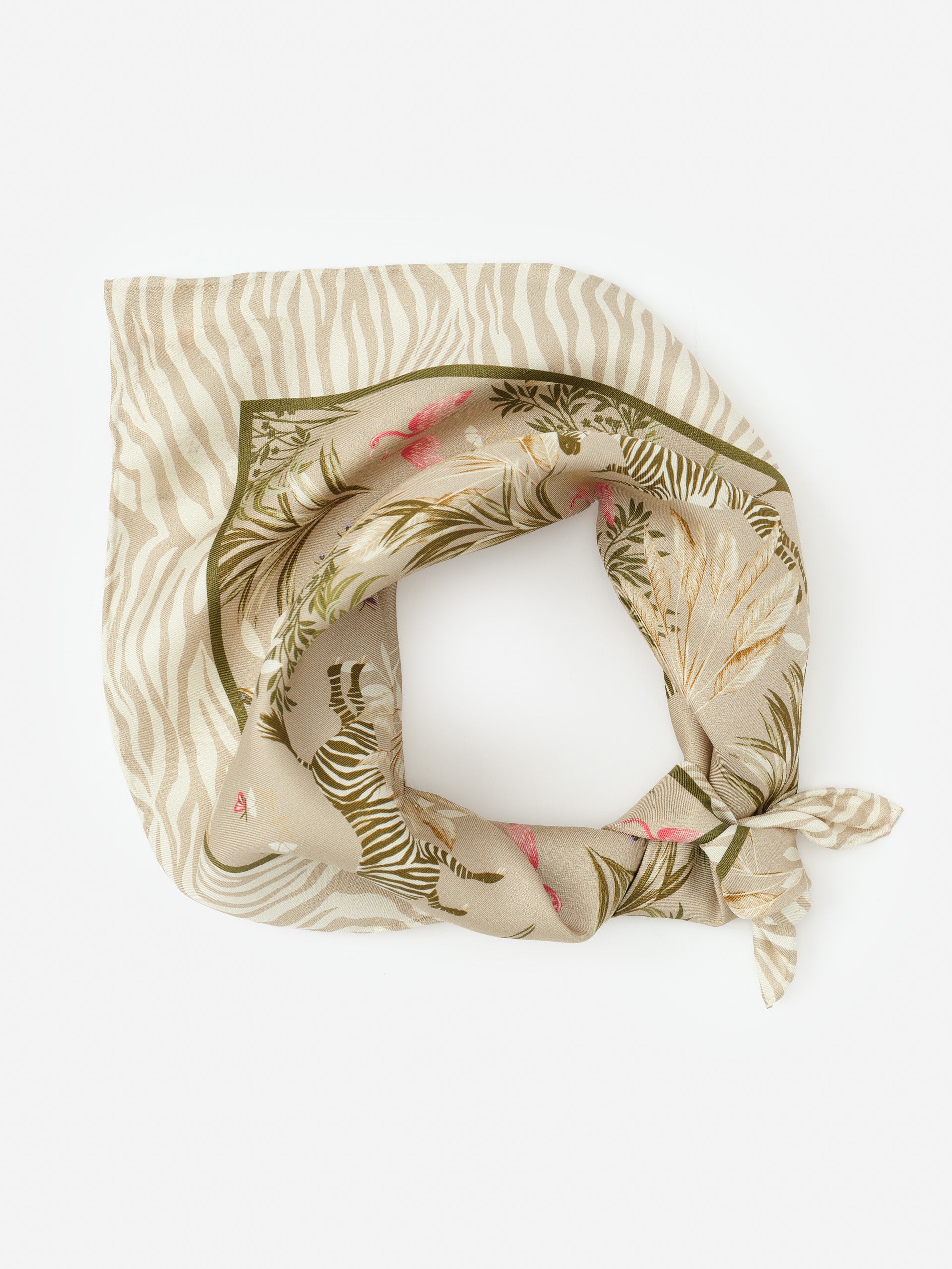 Nikka Silk Scarf in Zebra Story Court by J.McLaughlin features an elegant zebra and nature-inspired design in soft, innovative fabrics for effortlessly stylish looks and enduring designs.