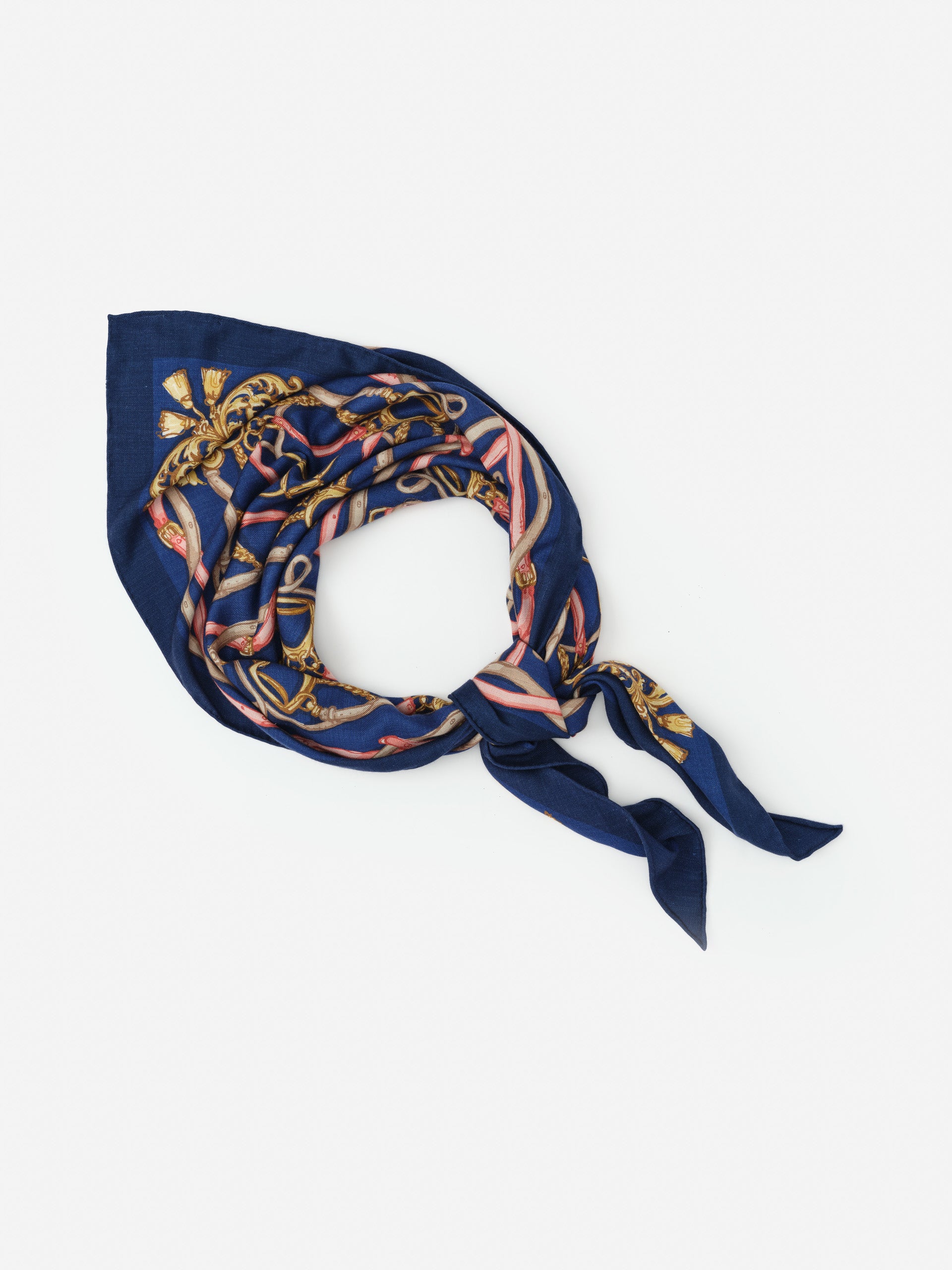 Sarita Scarf in Riding Lessons Corner by J.McLaughlin features a richly patterned navy scarf with elegant gold and pink accents, embodying effortlessly stylish, enduring designs and innovative fabrics. A destination for defining style. Life, Well-Lived.