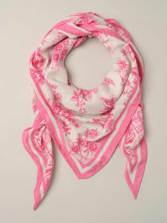 The Blair Scarf in Antique Toile Corner by J.McLaughlin in soft pink with an antique toile floral pattern and bordered design styled as a lightweight scarf