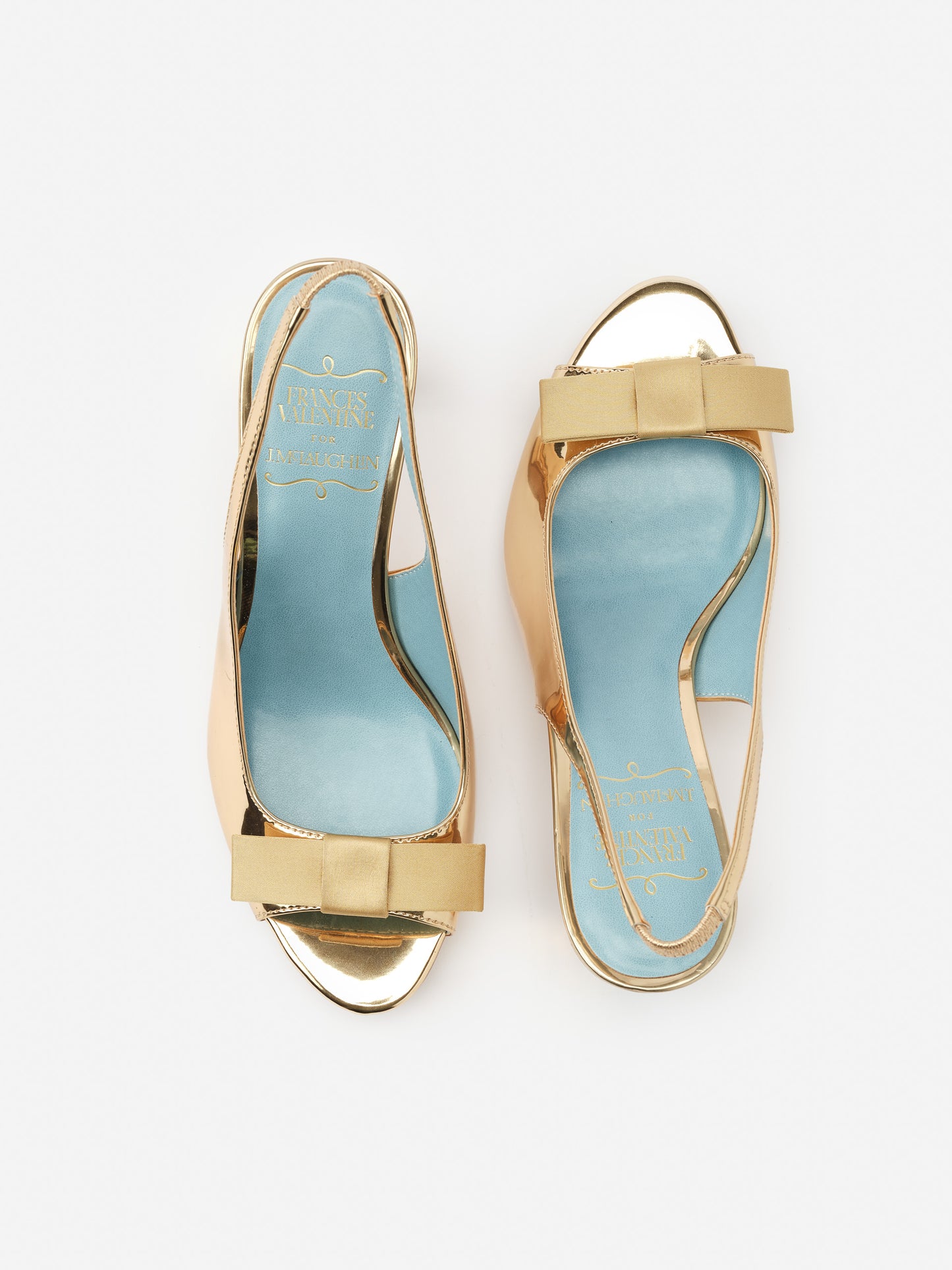Reese Slingbacks from J.McLaughlin feature effortlessly stylish design with a soft bow detail and innovative fabric blend, embodying enduring designs for a life well-lived.