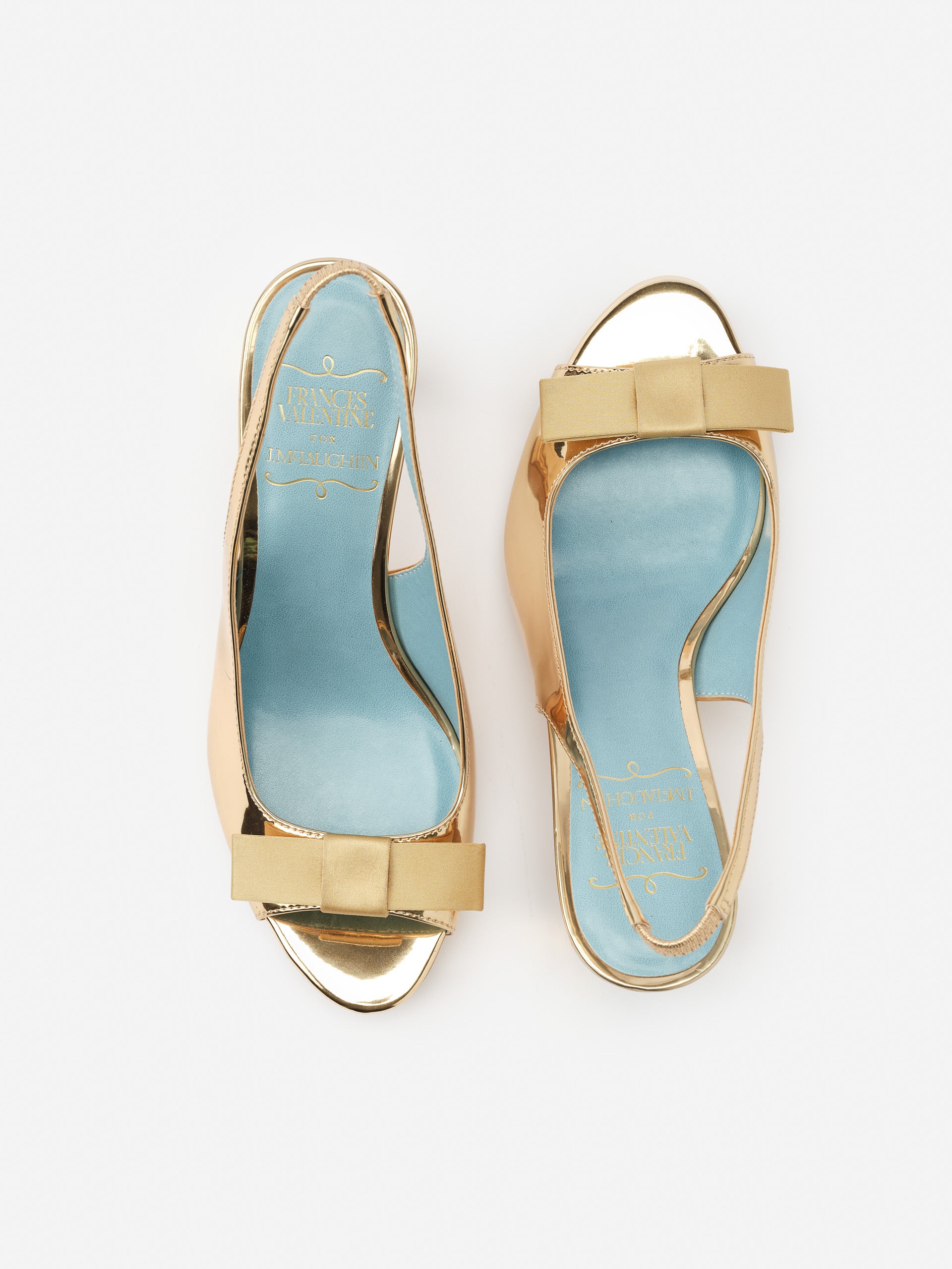 Reese Slingbacks from J.McLaughlin feature effortlessly stylish design with a soft bow detail and innovative fabric blend, embodying enduring designs for a life well-lived.