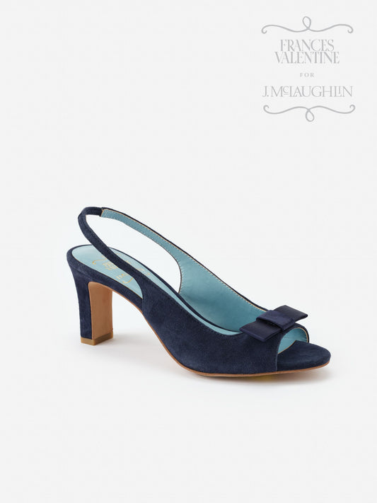Reese Suede Slingbacks in navy by J.McLaughlin feature a classic open-toe design with a mid heel and bow detail, blending enduring designs and impeccable craftsmanship for effortlessly stylish looks.
