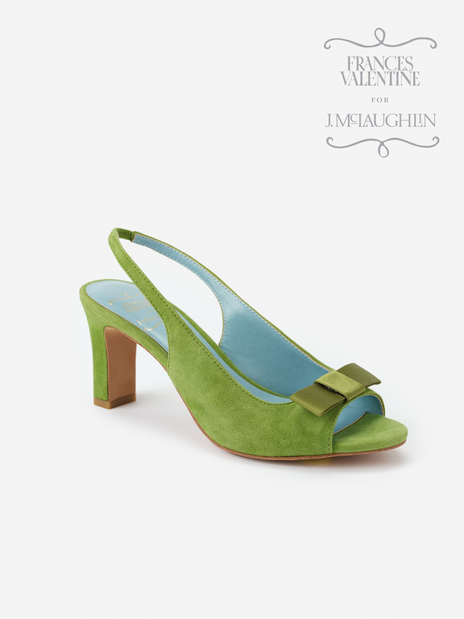 Reese Suede Slingbacks in vibrant green suede with an elegant bow detail and comfortable mid heel, showcasing J.McLaughlin’s effortlessly stylish, enduring designs and legacy of timeless fashion.