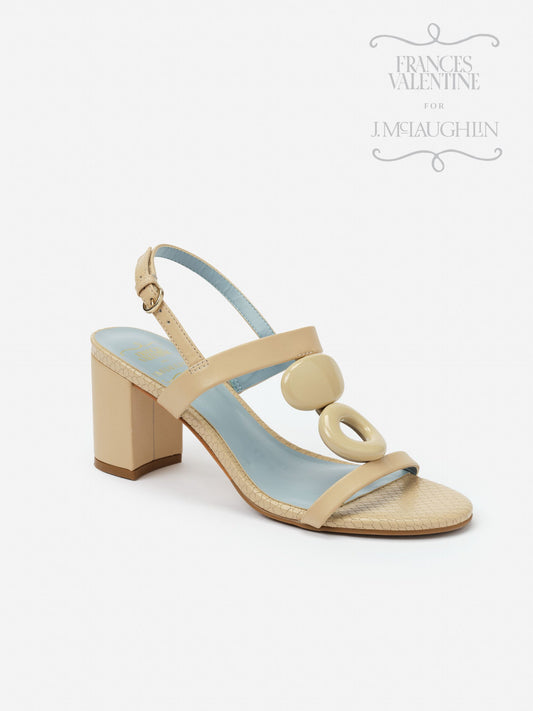 Beige Bianca Heels by J.McLaughlin featuring a block heel, slingback strap, and decorative circular accents, combining effortlessly stylish design with enduring appeal.