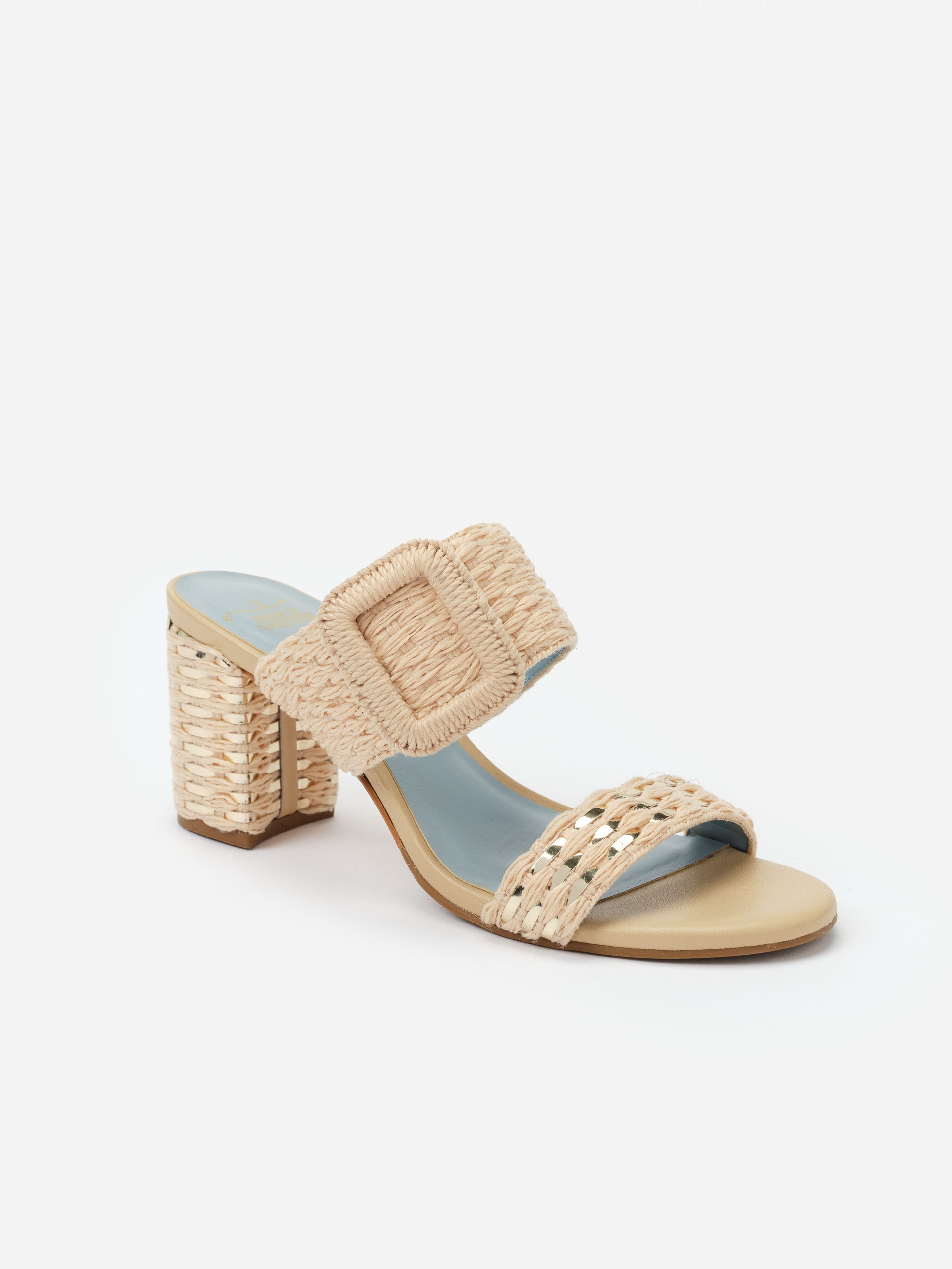 Betty Heels by J.McLaughlin feature an effortlessly stylish design with woven straps and a block heel, blending enduring designs and innovative fabrics for timeless fashion.