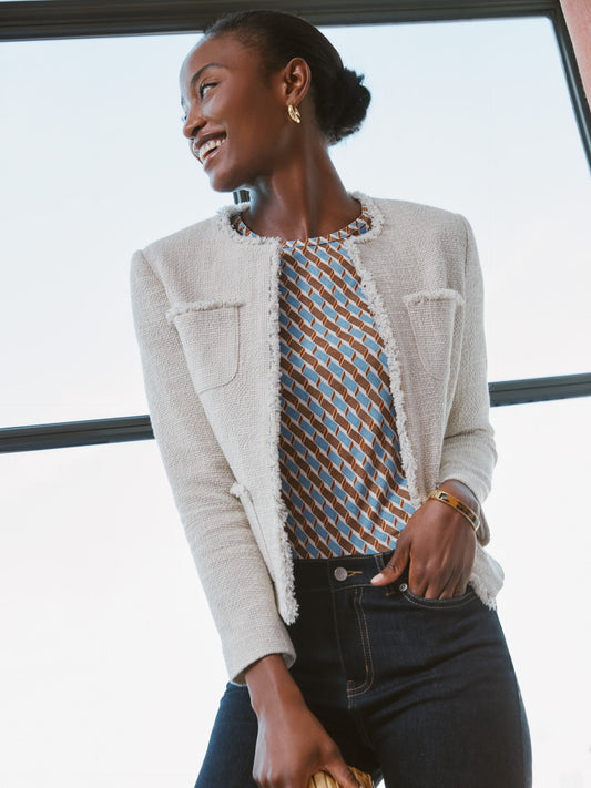 Model wears J.McLaughlin Martha jacket in natural made with cotton/modal.