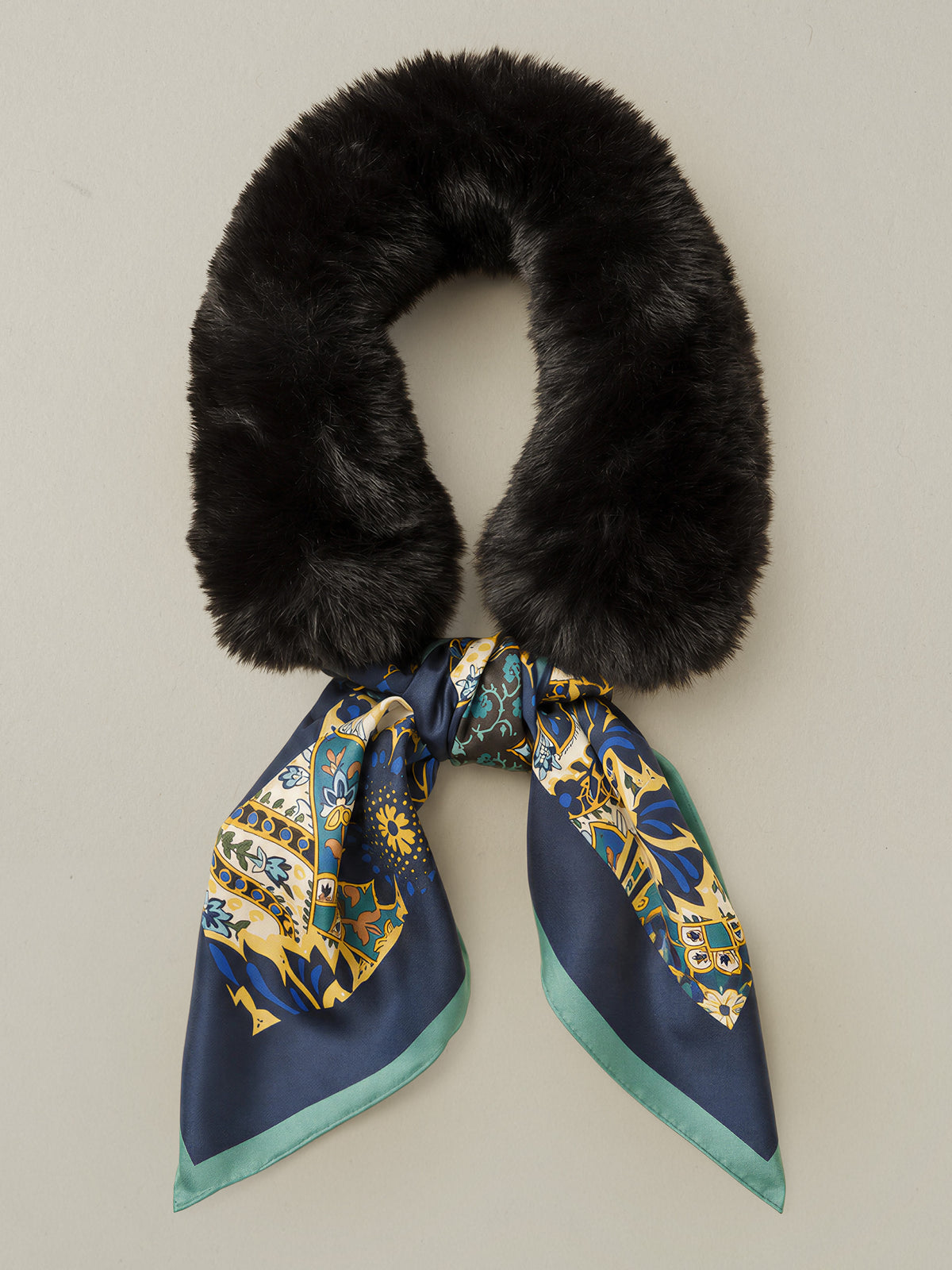 Camille Faux Fur Neckwarmer in Imperial Paisley Square by J.McLaughlin with a plush black faux fur collar and blue paisley silk scarf tails