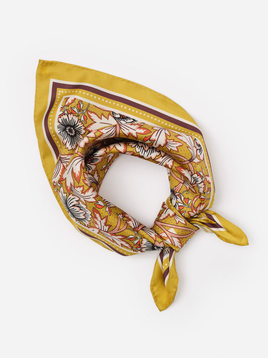 The Eloise Silk Scarf in Belle Epoque Bloom by J.McLaughlin features a floral pattern in warm tones on luxurious silk, perfect for adding a stylish touch to any outfit.
