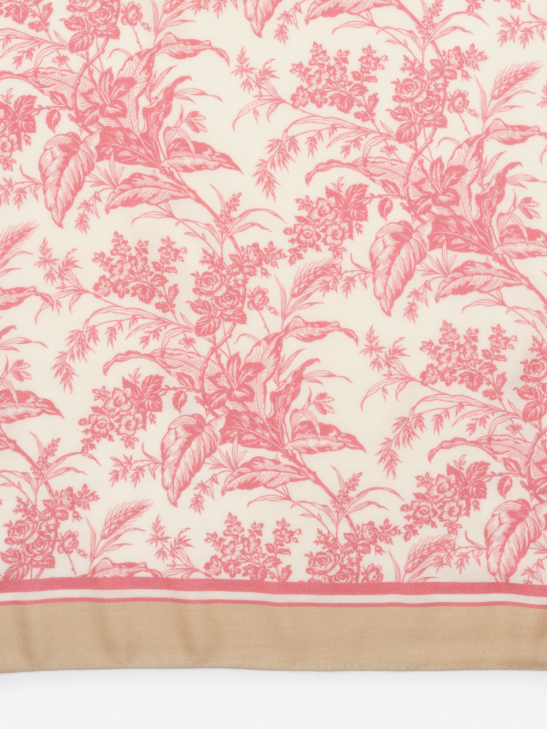 Delicate floral pattern in soft red tones on a cream background with a tan border, showcasing the Sarita Scarf in Giardino Toile Corner by J.McLaughlin, effortlessly stylish and enduring design. A destination for defining style. Life, Well-Lived.