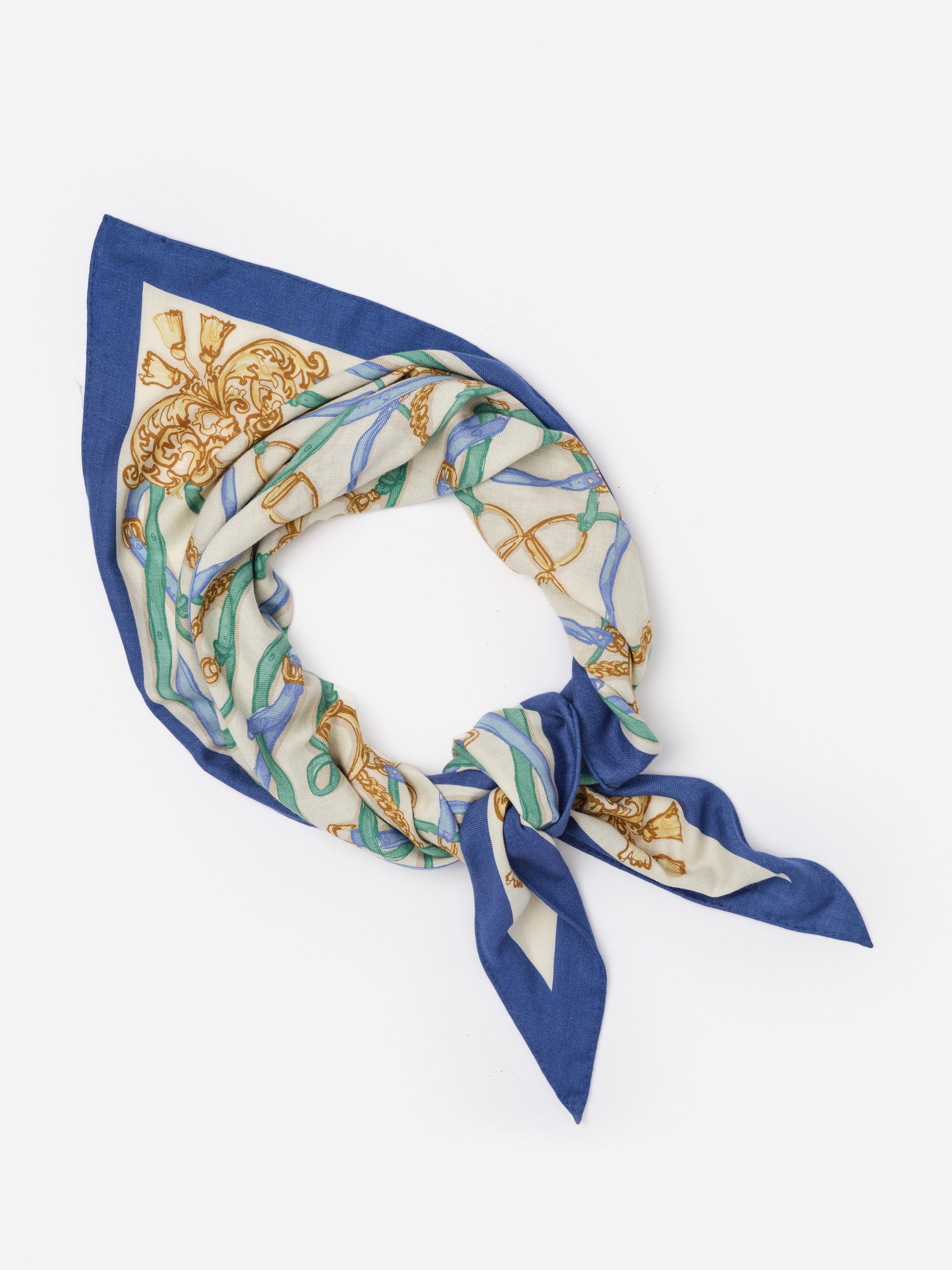 Sarita Scarf in Riding Lessons Corner by J.McLaughlin, featuring effortlessly stylish patterns in blue, green, and gold tones, reflecting enduring designs and timeless fashion.