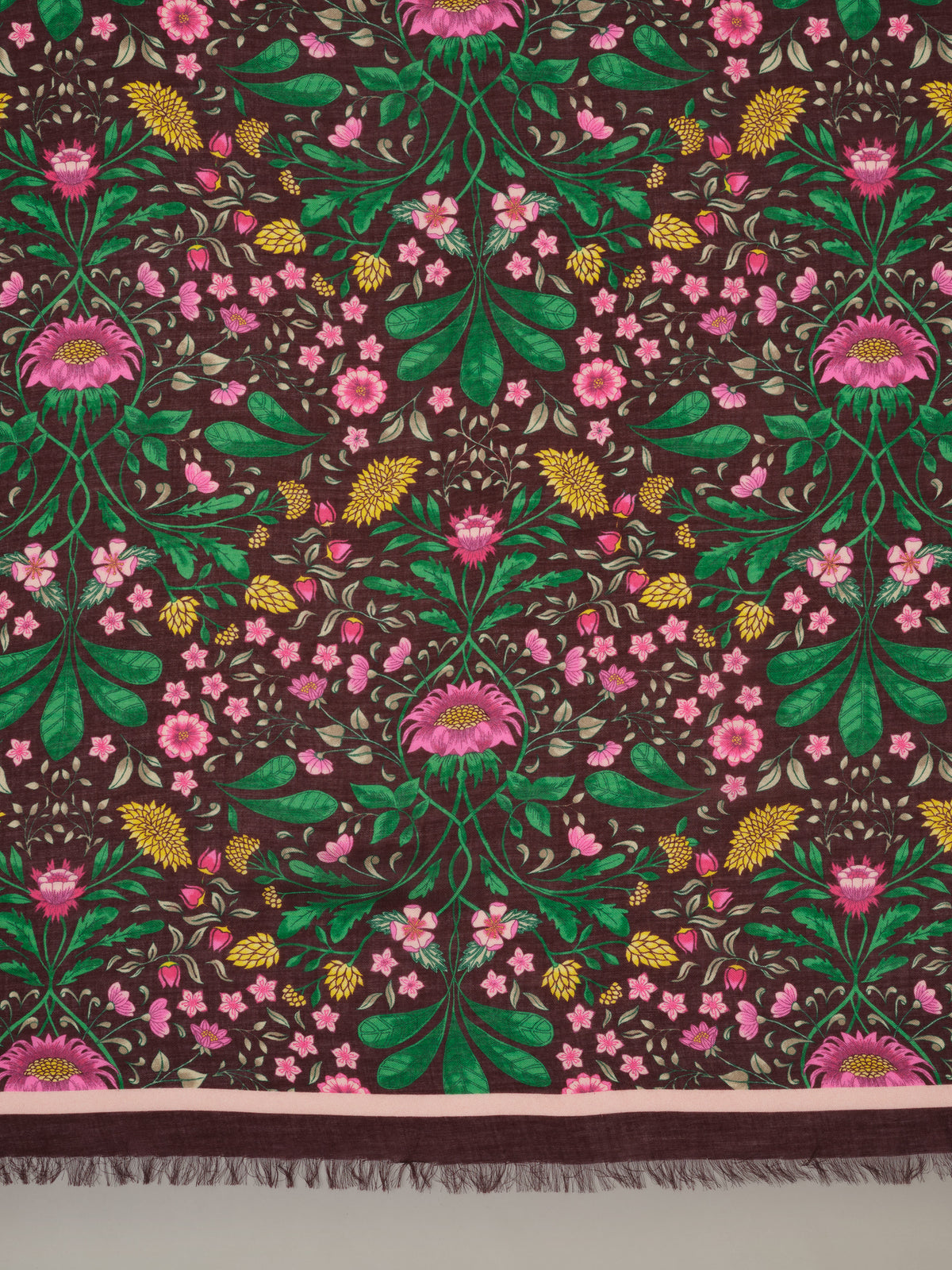 The Katherine Scarf in Mega Manor Floral Border featuring a richly colored floral pattern with leafy details and fringed trim