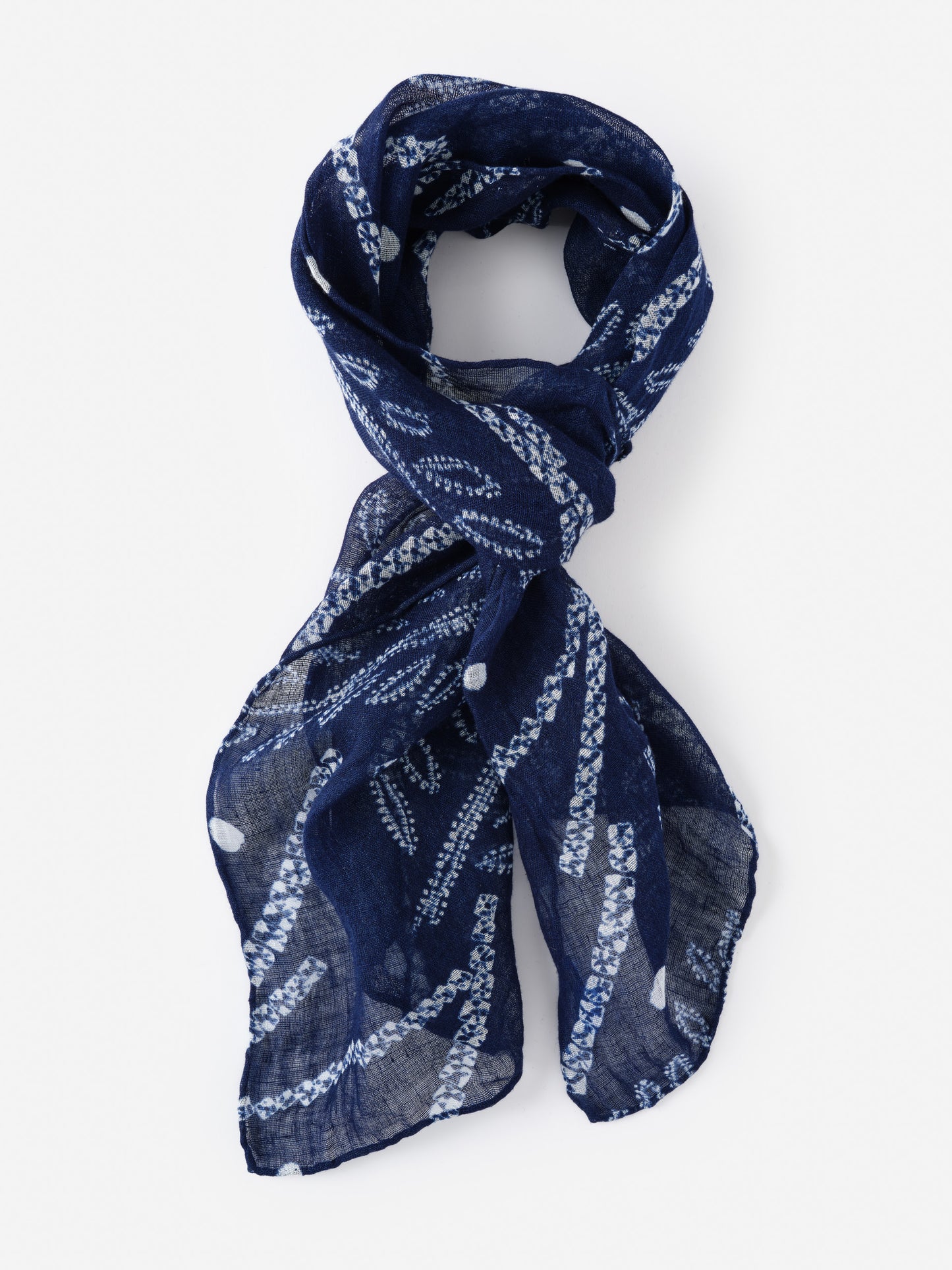Men's Linen Scarf in Shibori Leaves by J.McLaughlin, showcasing effortlessly stylish design with innovative fabric, perfect for enduring designs in timeless fashion.