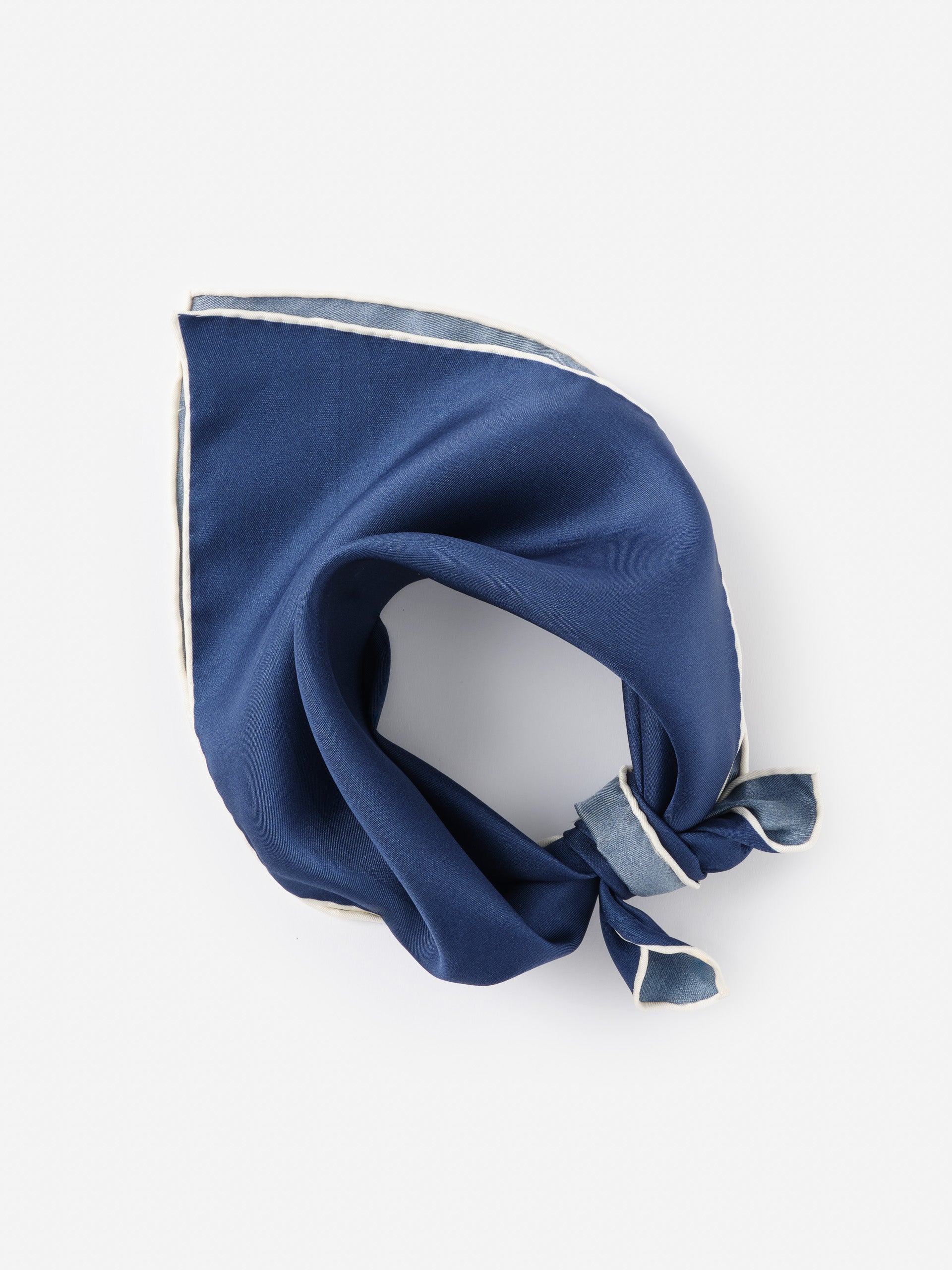 Xani Silk Scarf by J.McLaughlin in rich navy with a subtle contrasting edge, showcasing effortlessly stylish, enduring designs crafted from innovative fabrics in a legacy of timeless fashion. A destination for defining style. Life, Well-Lived.