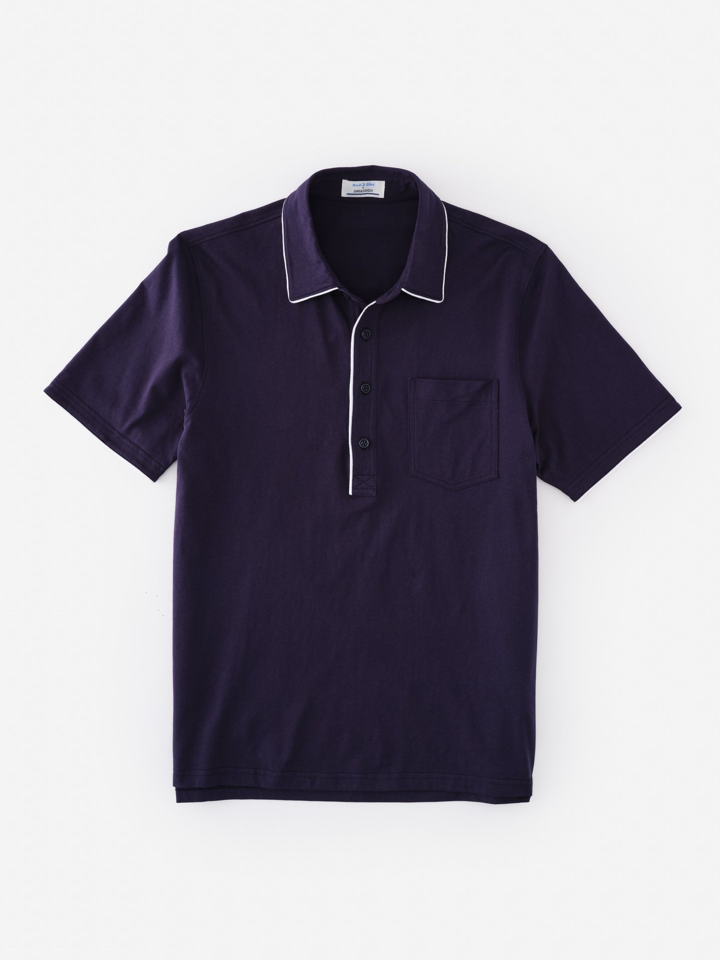 Ryan Polo by J.McLaughlin in deep navy with white piping, featuring a classic collar and chest pocket, showcasing effortlessly stylish and enduring designs in shirts. A destination for defining style. Life, Well-Lived.