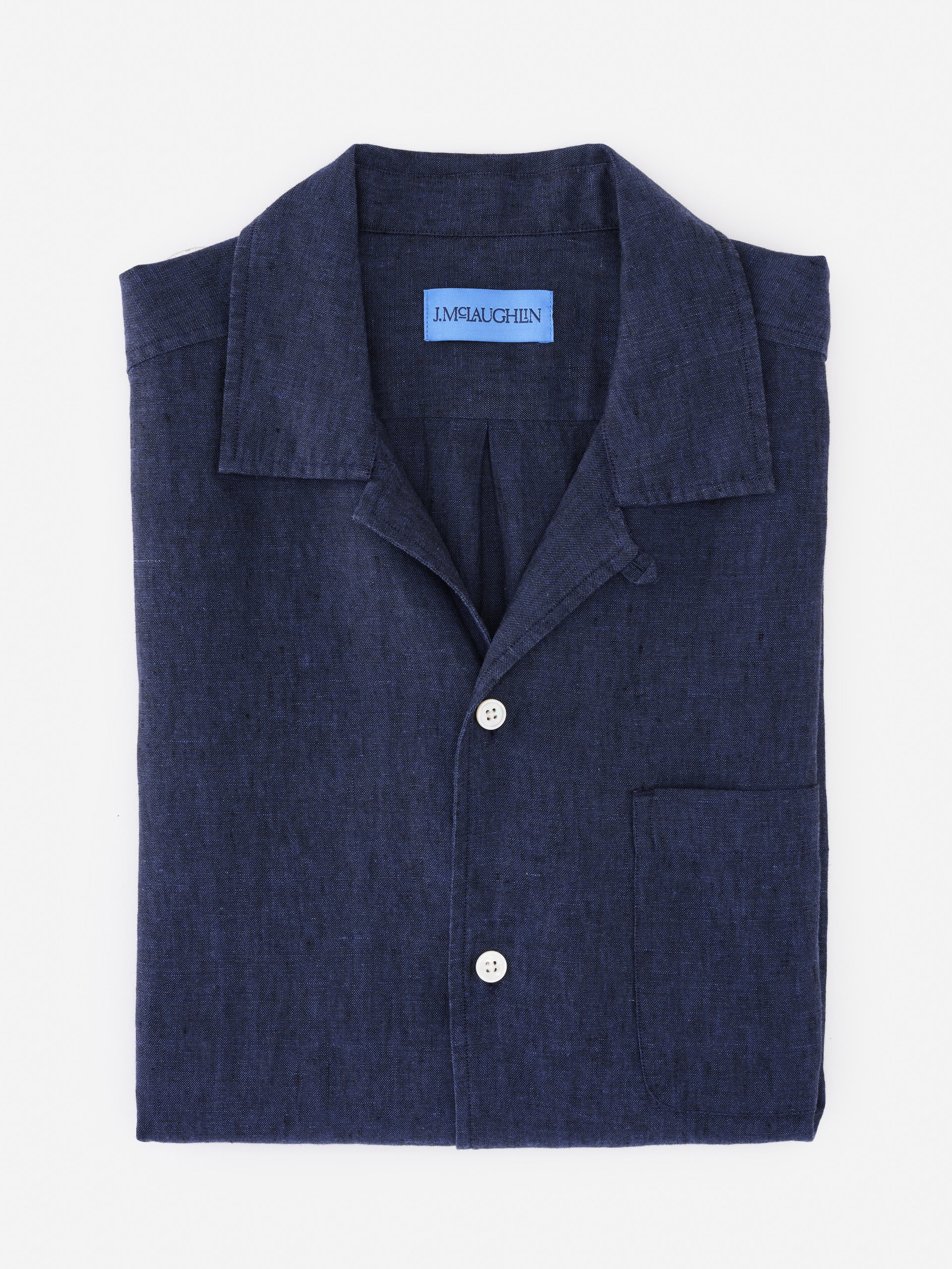 Folded navy blue Montauk Linen Shirt by J.McLaughlin showcasing classic craftsmanship with enduring design and innovative fabrics, effortlessly stylish for a life well-lived.