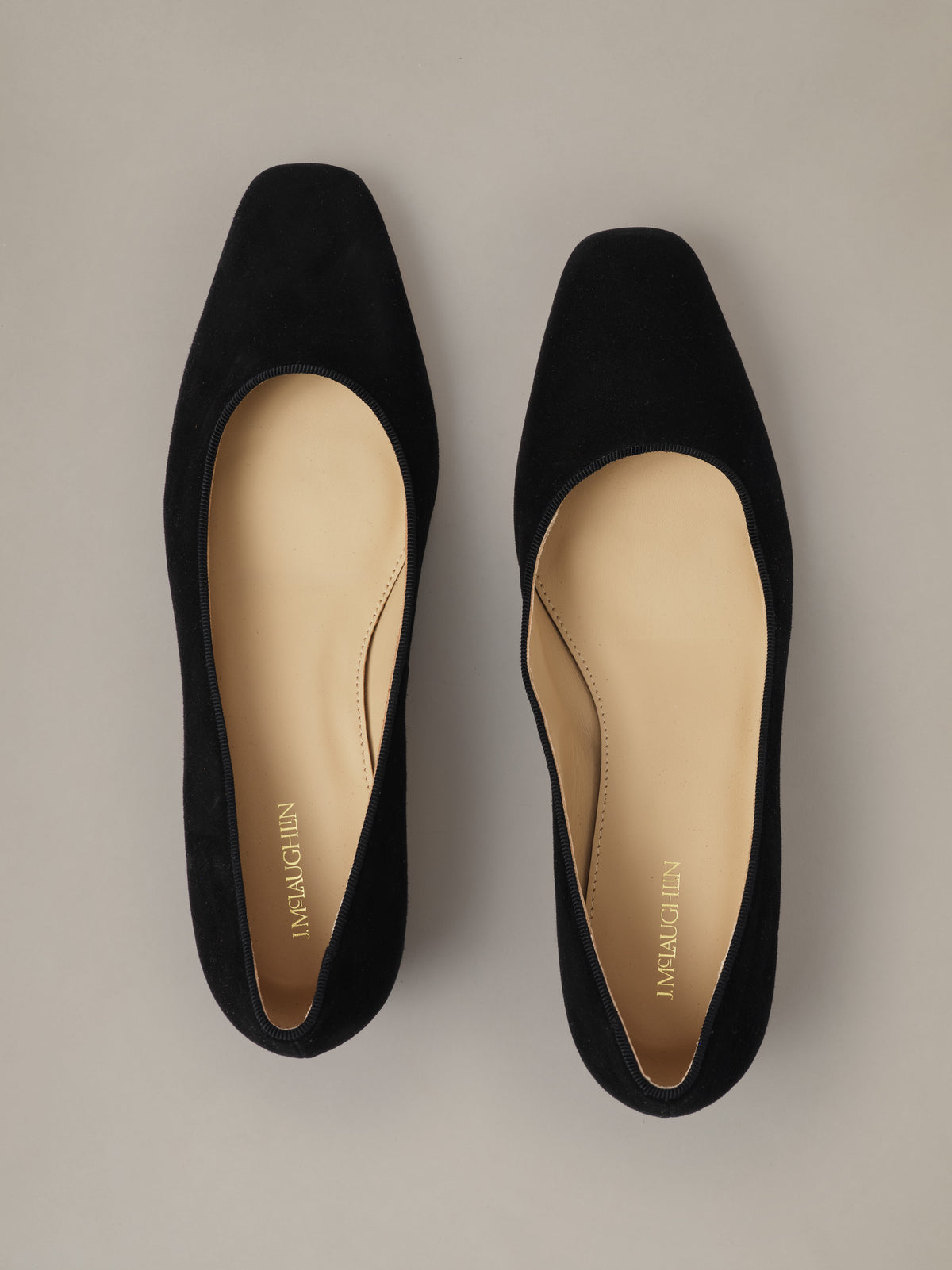 J.McLaughlin Josie Suede Pumps in black suede shown from above with softly rounded toes and classic low heels for polished everyday style