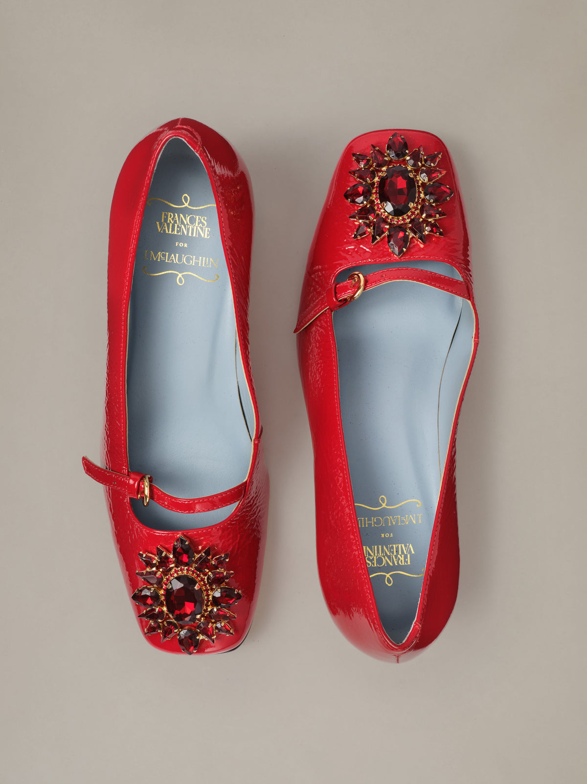 Jojo Leather Mary Jane Pumps in red leather with square toes and ornate floral rosette buckles by J.McLaughlin. Classic shoes with romantic detail.