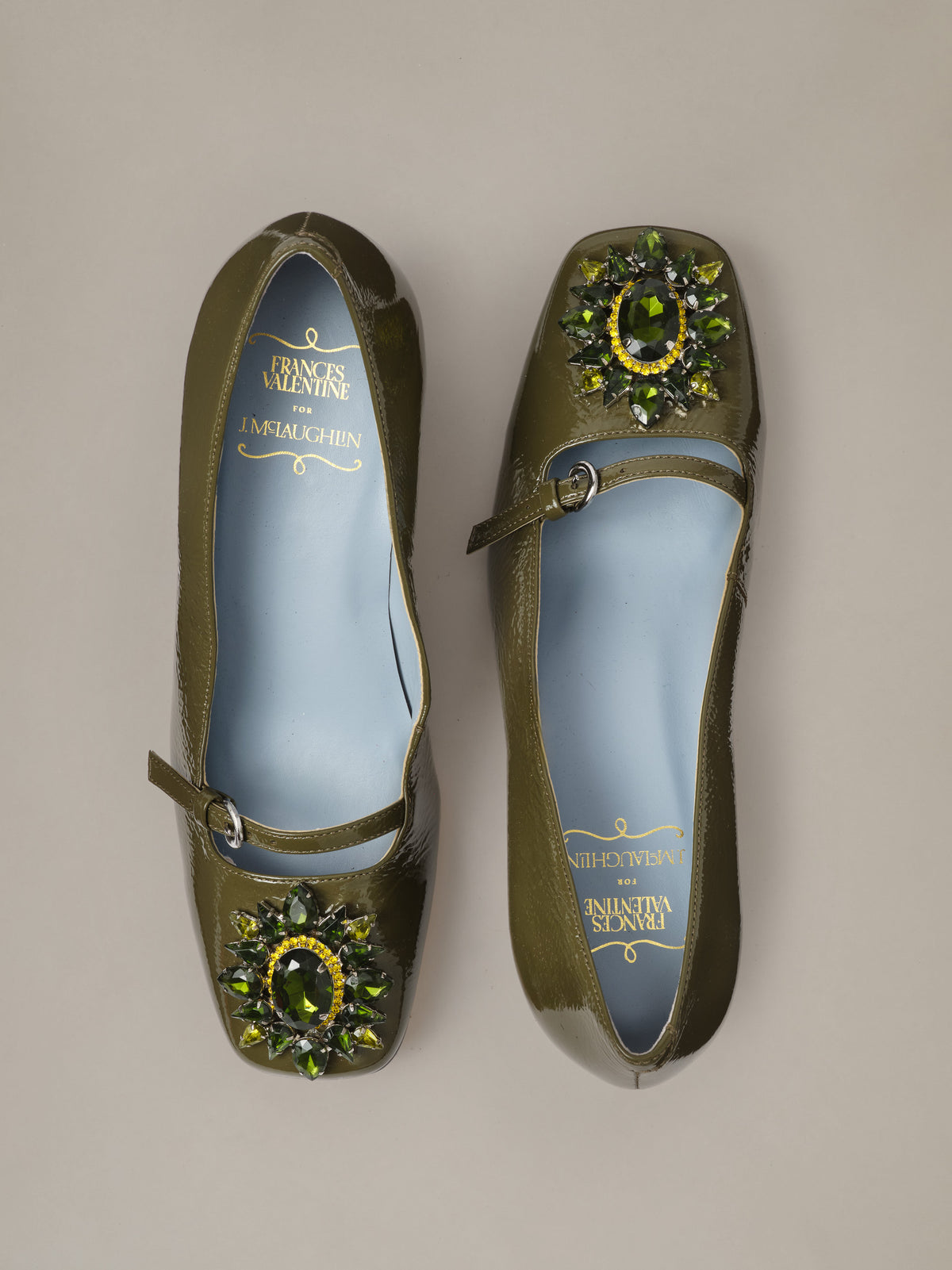Jojo Leather Mary Jane Pumps by J.McLaughlin in olive leather with square toes jeweled floral rosette buckles and adjustable Mary Jane straps