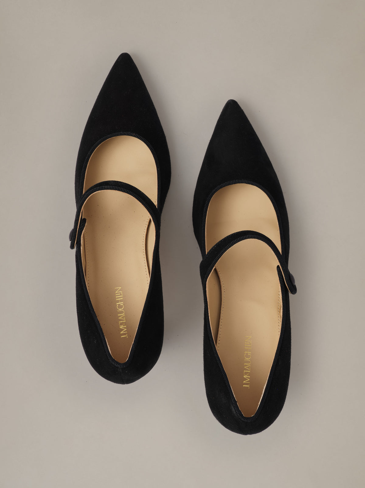 Katie Suede Pumps by J.McLaughlin in black suede with pointed toes classic Mary Jane straps and elegant heels