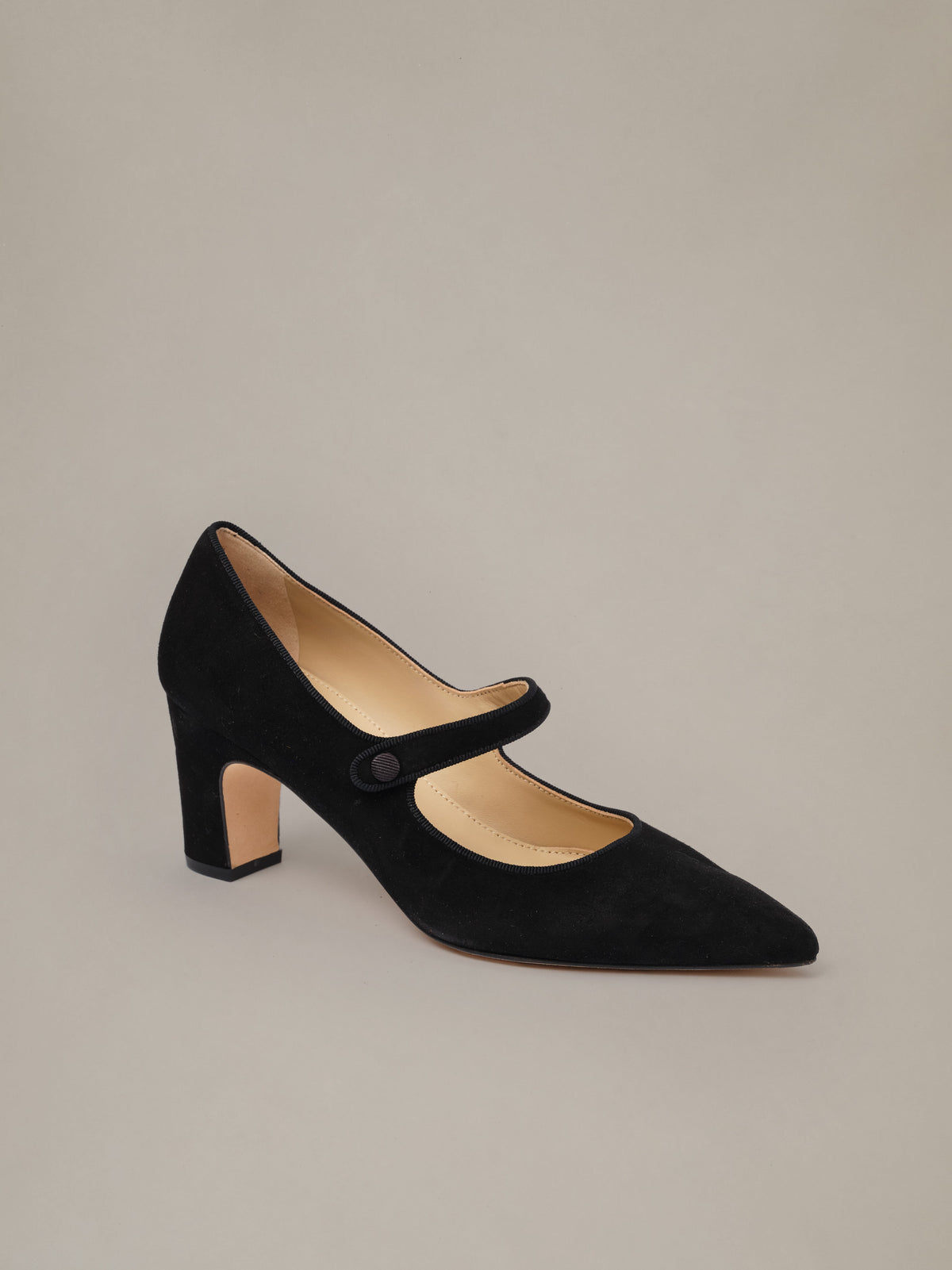 Katie Suede Pumps by J.McLaughlin in black suede with a pointed toe classic Mary Jane strap and two and three quarter inch block heel