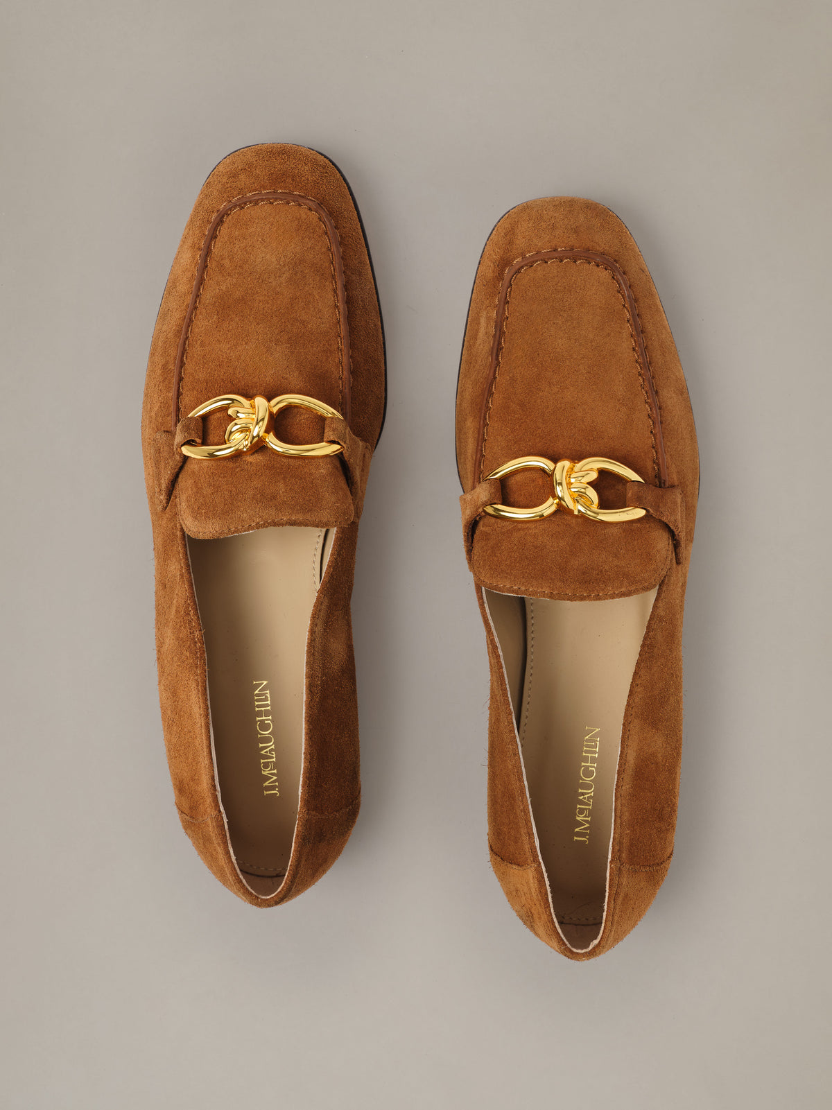 Mila Suede Loafers by J.McLaughlin in brown suede with gold chain accents shown as a pair of classic loafers
