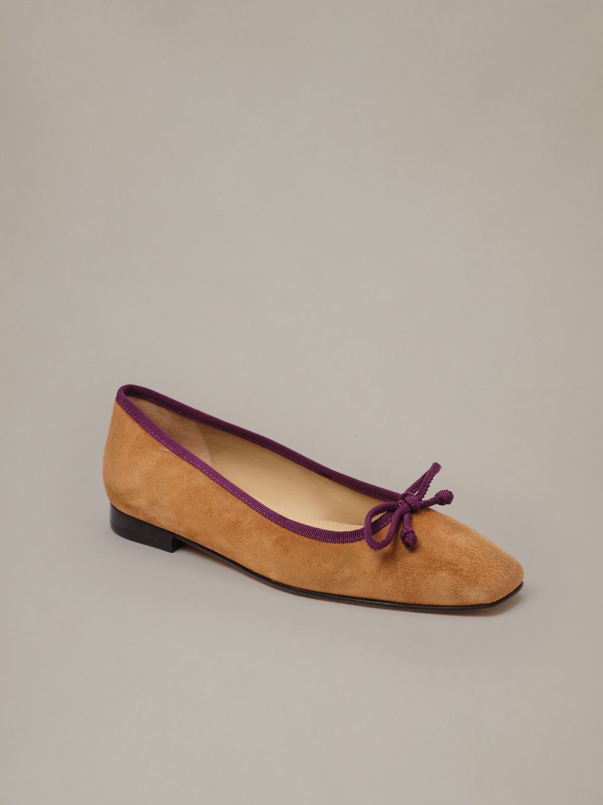 Viola Suede Ballet Flats by J.McLaughlin in tan suede with a square toe purple trim and delicate bow detail