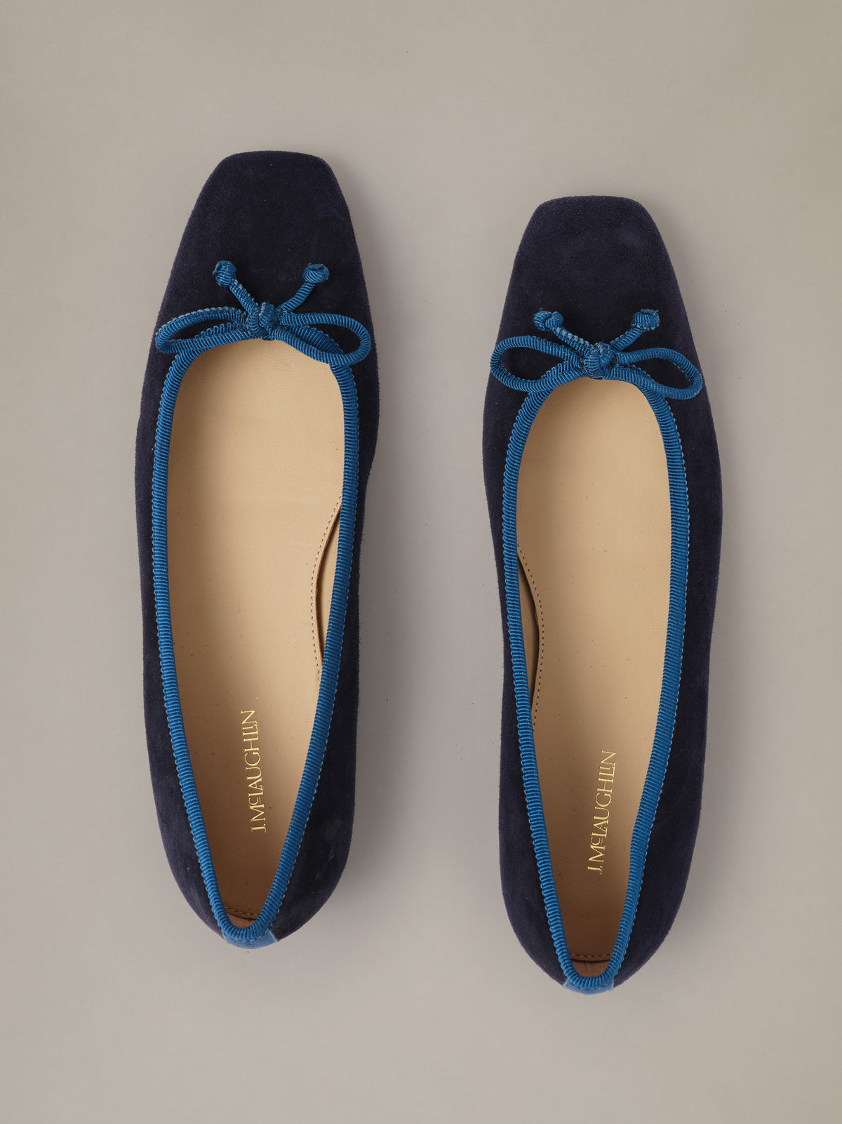 Viola Suede Ballet Flats by J.McLaughlin in navy suede with square toes and blue trim bows shown from above