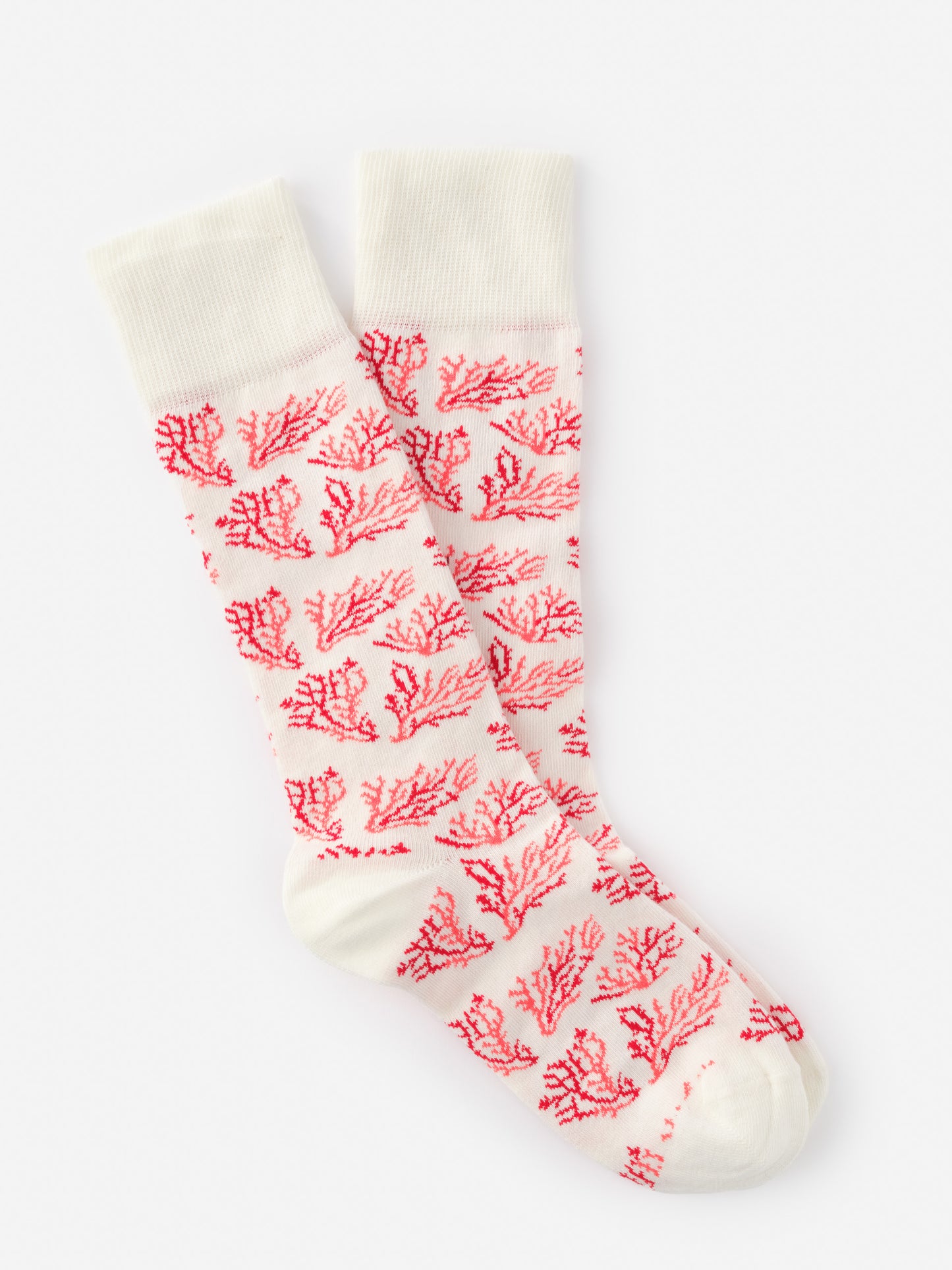 Socks in Midi Coral Cay Texture by J.McLaughlin featuring an elegant coral branch pattern on a creamy white background, combining effortlessly stylish design with enduring comfort. A destination for defining style. Life, Well-Lived.