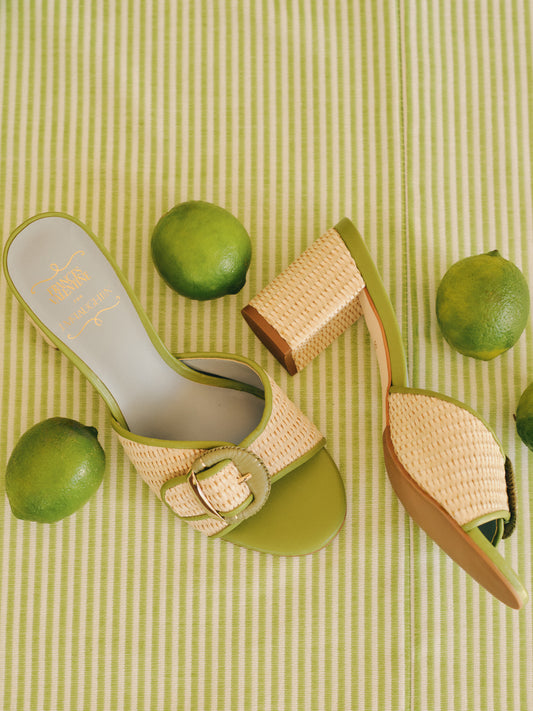 Taylor Heels by J.McLaughlin feature a woven design with green leather accents and a block heel, blending effortlessly stylish, enduring designs with a legacy of timeless fashion.